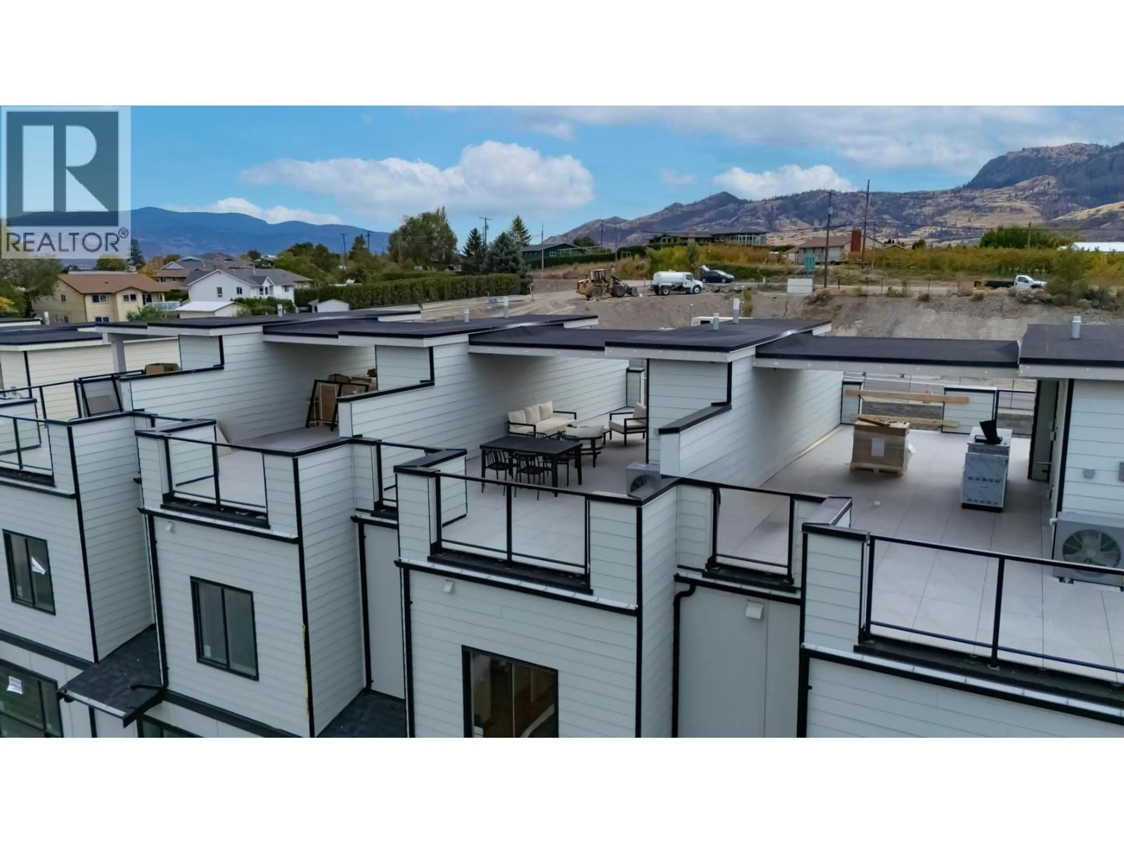 A pic from outside/outdoor area/front of a property/back of a property/a pic from drone, mountain view for 14 - 4601 97TH STREET, Osoyoos British Columbia V0H1V1