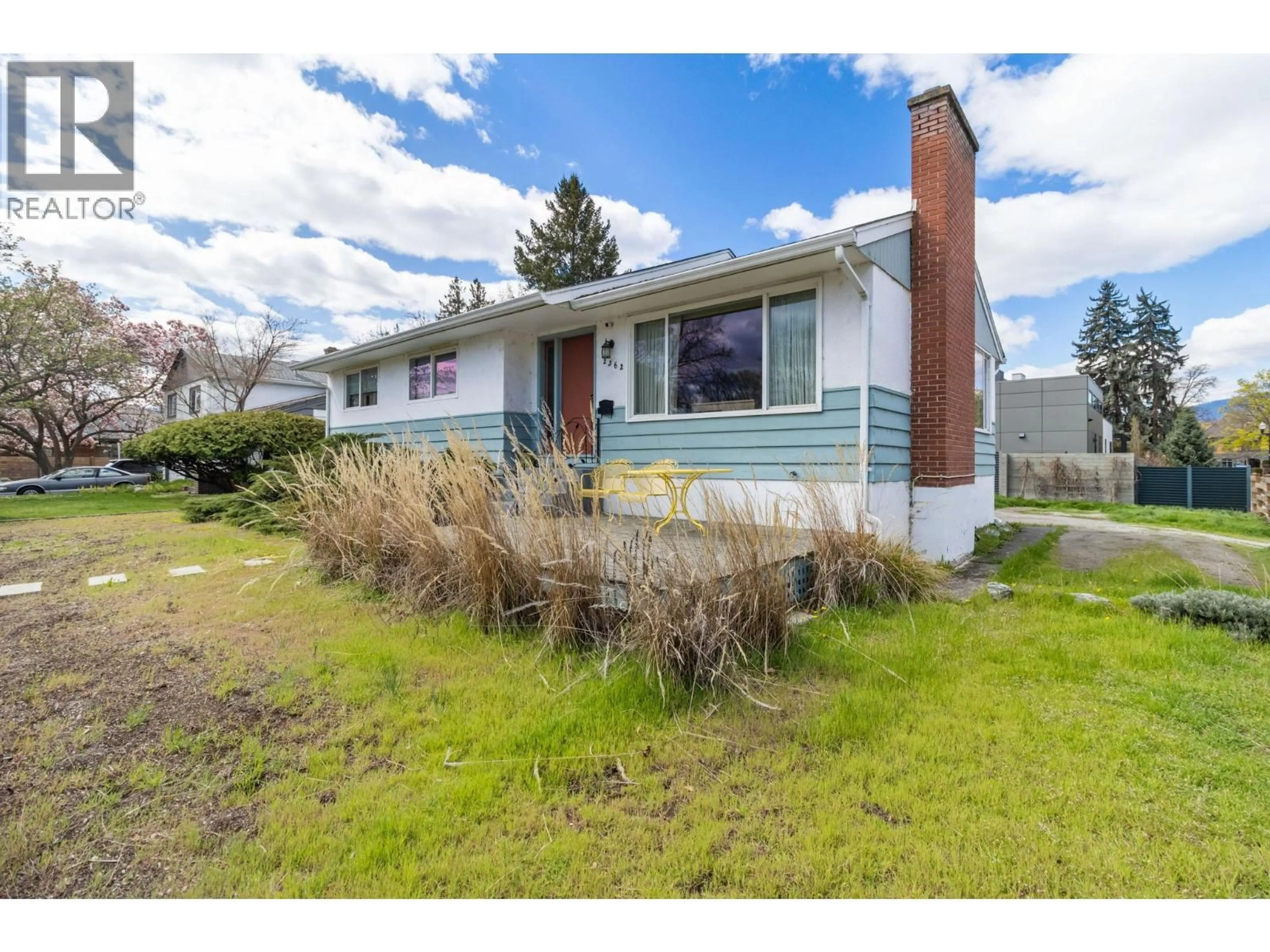 Home with vinyl exterior material, street for 2362 ABBOTT STREET, Kelowna British Columbia V1Y1E6