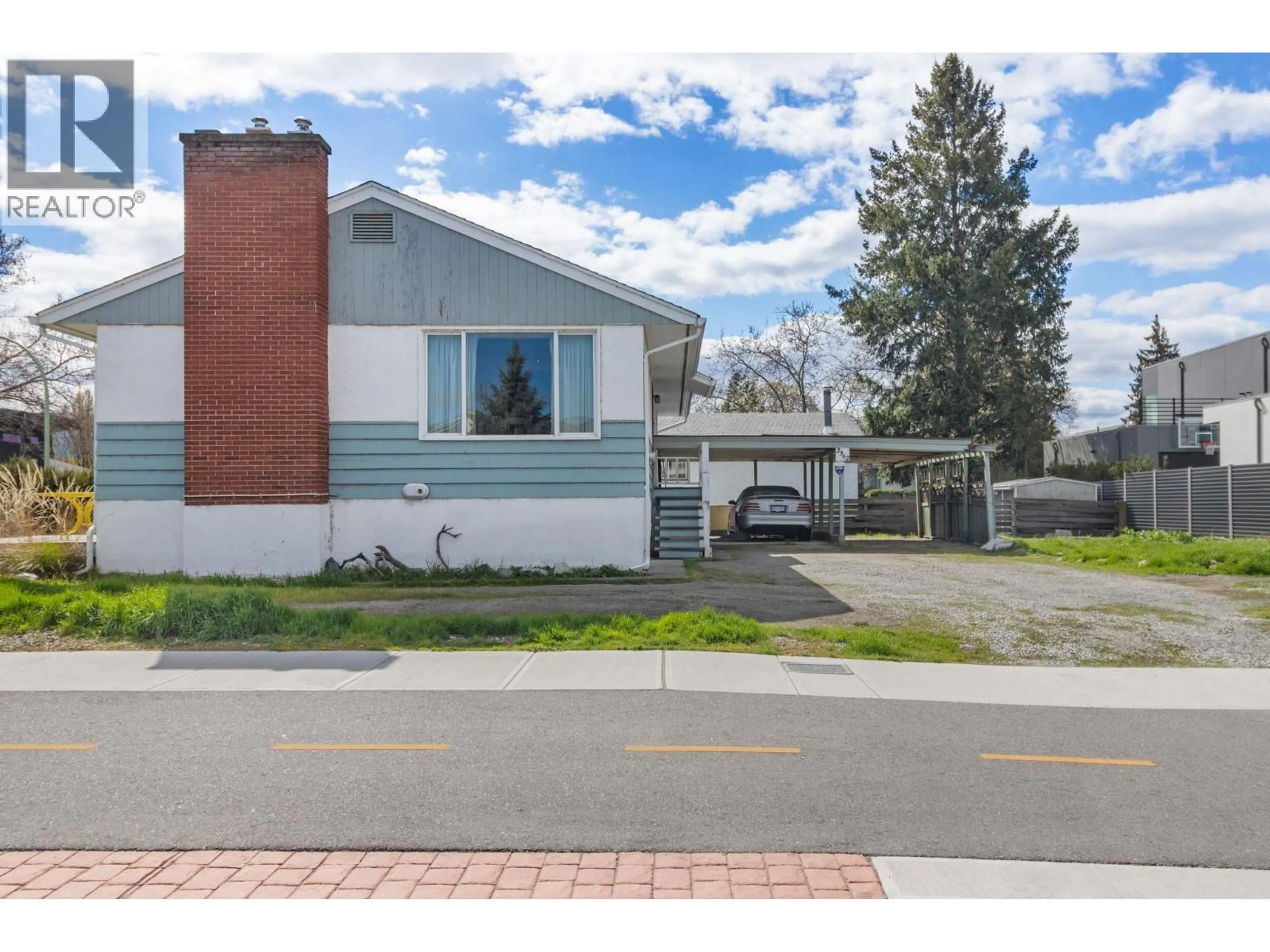 Home with vinyl exterior material, street for 2362 ABBOTT STREET, Kelowna British Columbia V1Y1E6