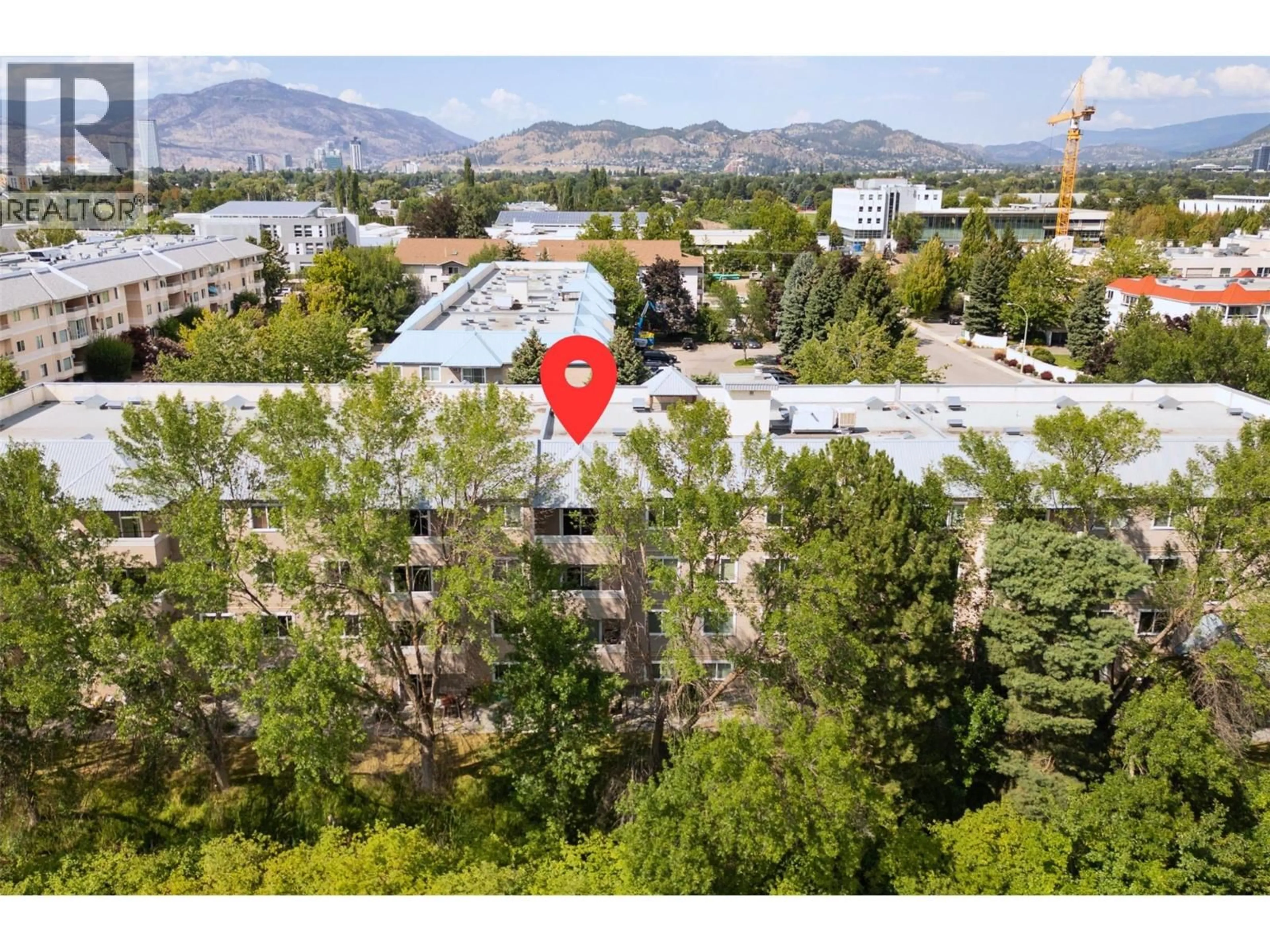 A pic from outside/outdoor area/front of a property/back of a property/a pic from drone, mountain view for 407 - 3180 DE MONTREUIL COURT, Kelowna British Columbia V1W3W4