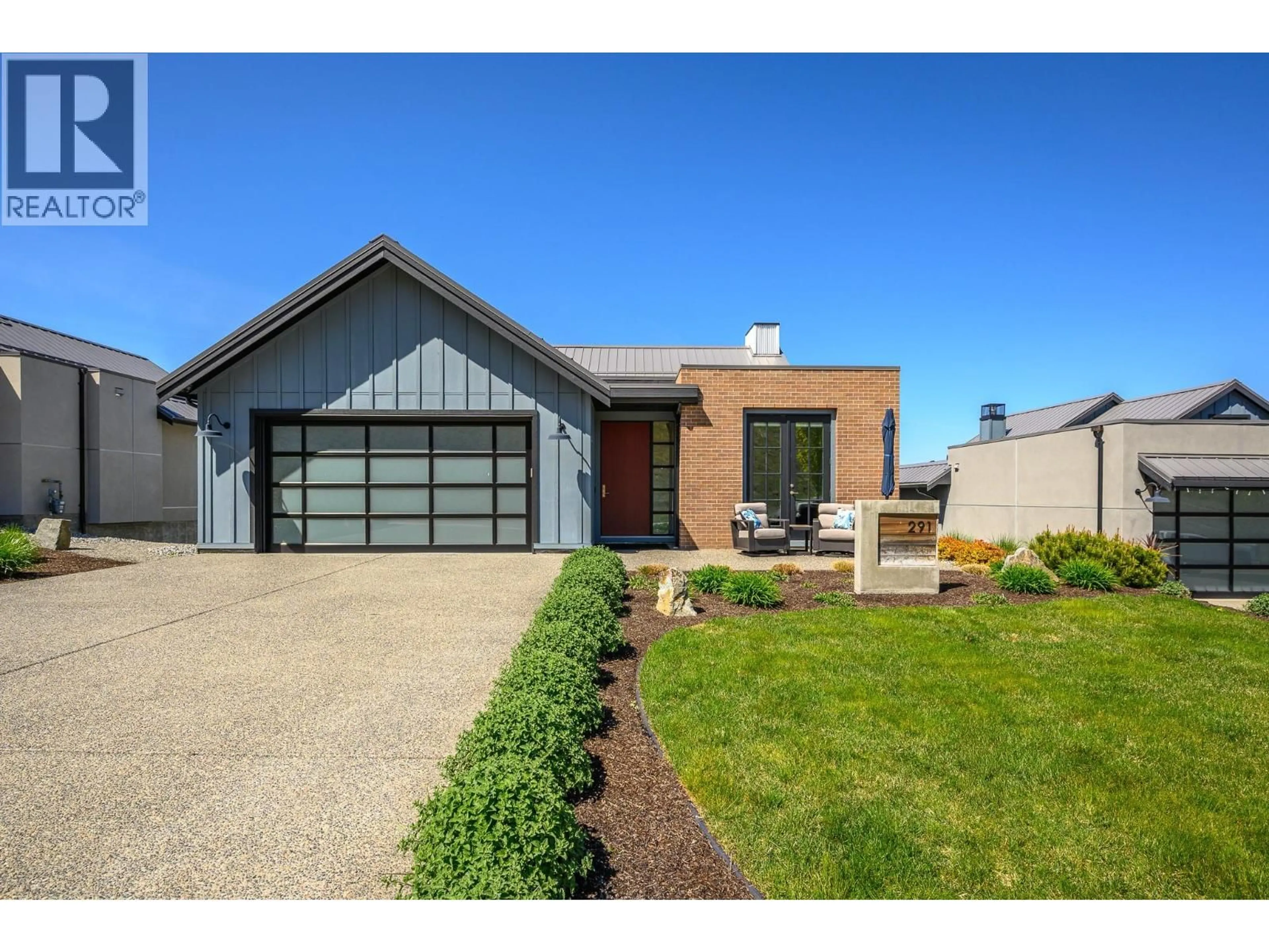 Home with brick exterior material, street for 291 GRANGE DRIVE, Vernon British Columbia V1H2M1