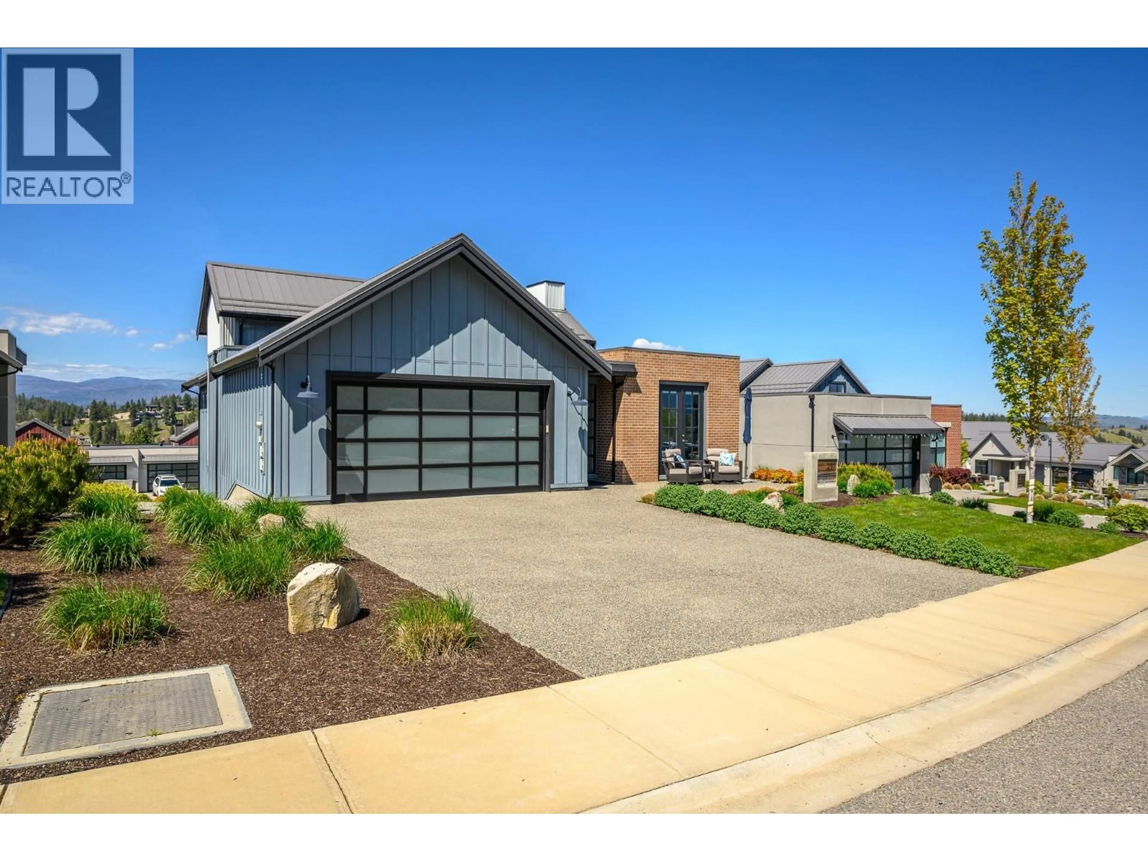 Home with brick exterior material, street for 291 GRANGE DRIVE, Vernon British Columbia V1H2M1