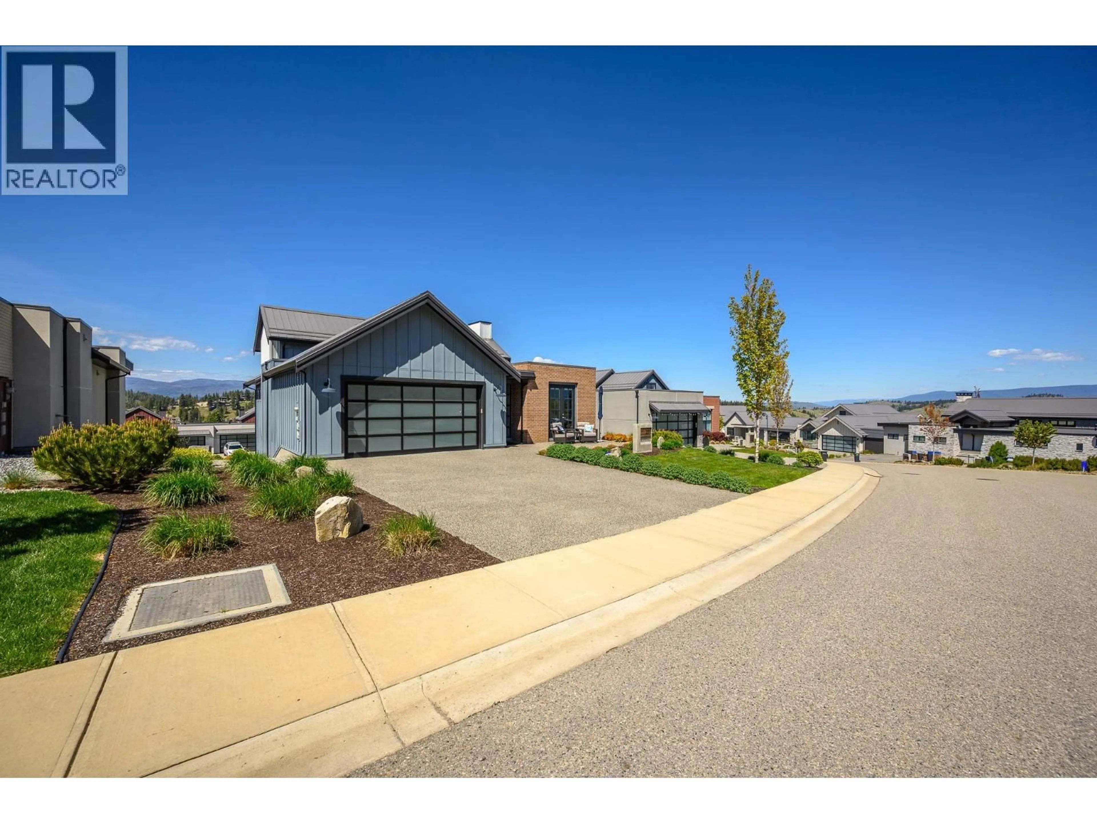 Home with brick exterior material, street for 291 GRANGE DRIVE, Vernon British Columbia V1H2M1