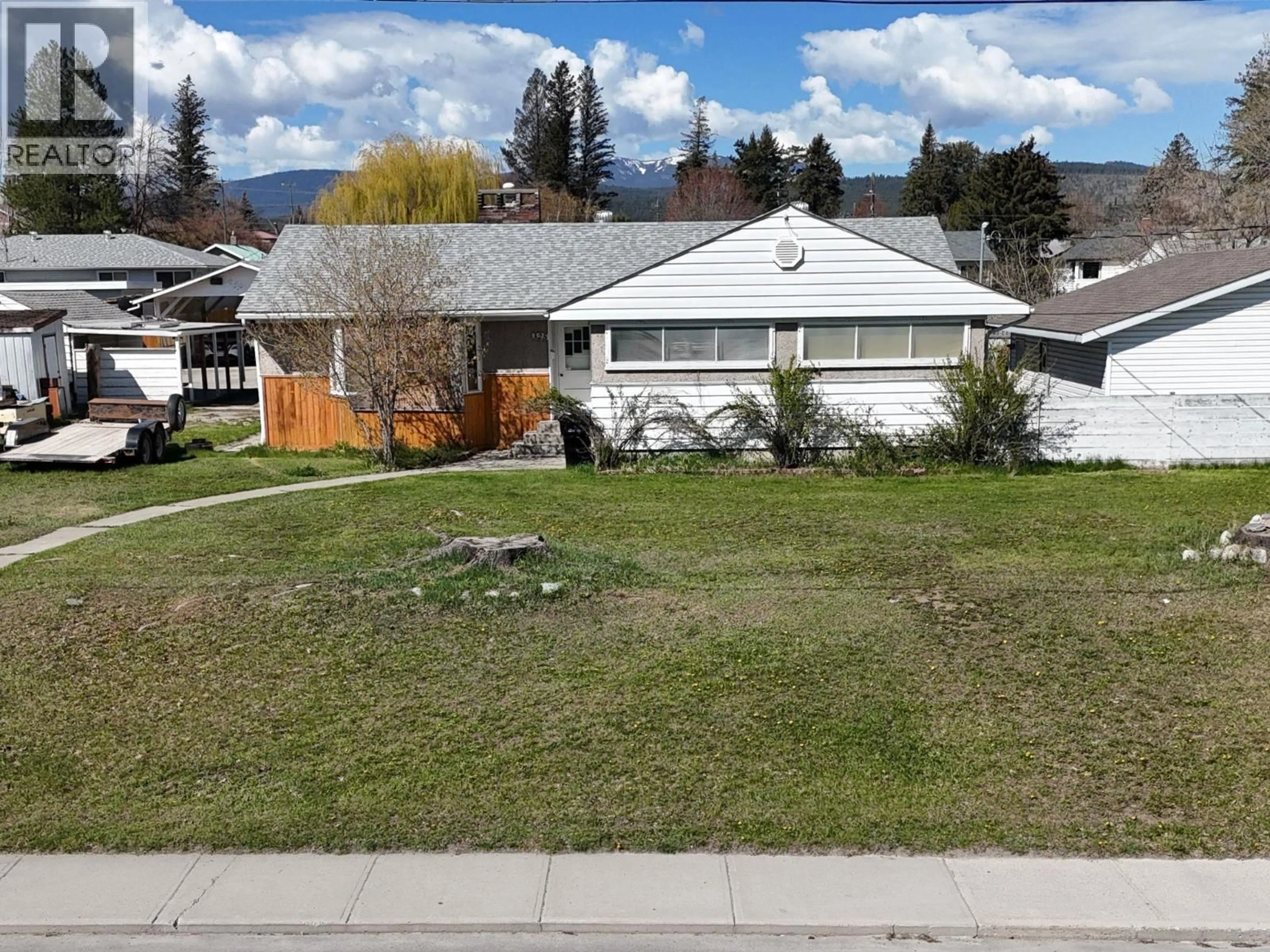 A pic from outside/outdoor area/front of a property/back of a property/a pic from drone, mountain view for 325 14 AVENUE SOUTH, Cranbrook British Columbia V1C2X5