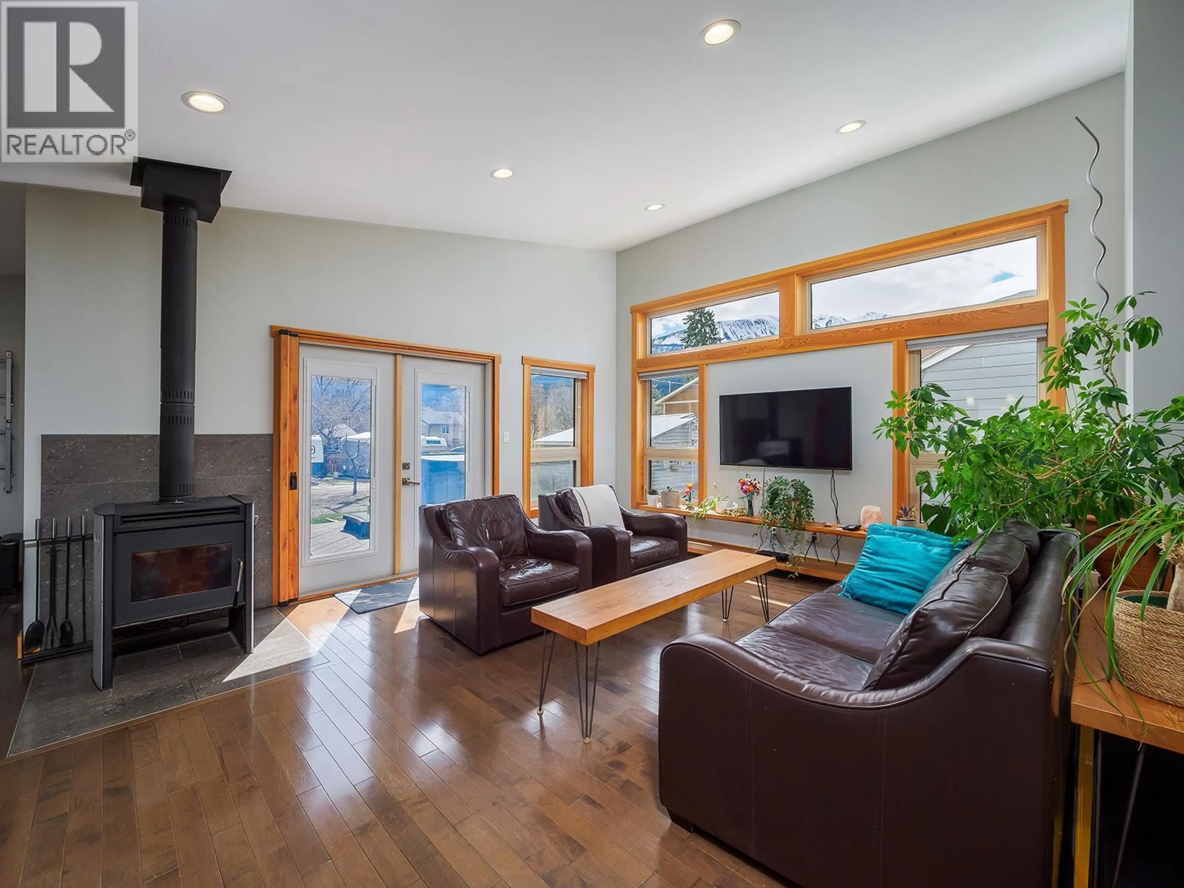 Living room with furniture, wood/laminate floor for 908 12TH STREET SOUTH, Golden British Columbia V0A1H0