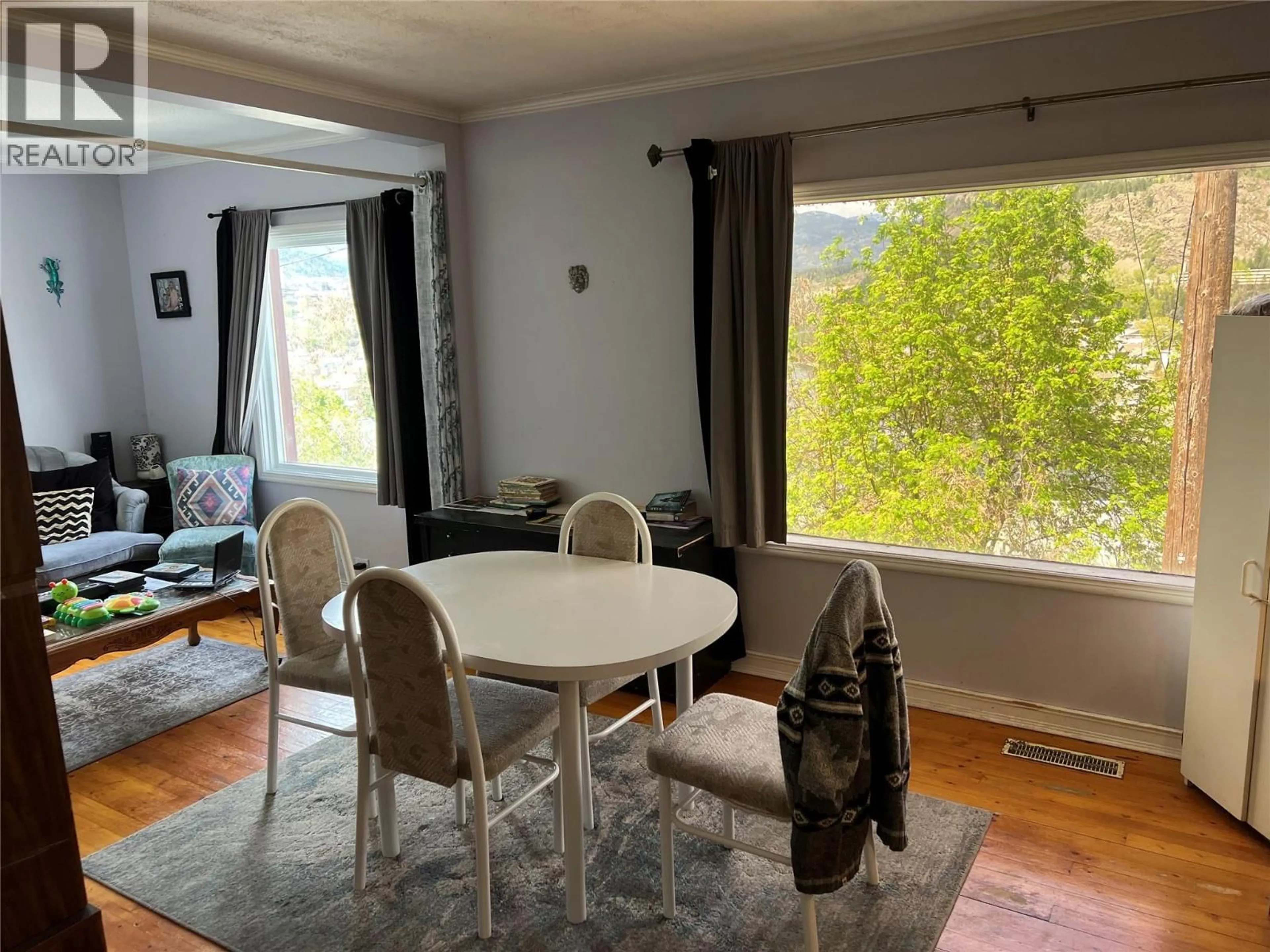 Dining room, wood/laminate floor for 2008 TOPPING STREET, Trail British Columbia V1R4G5