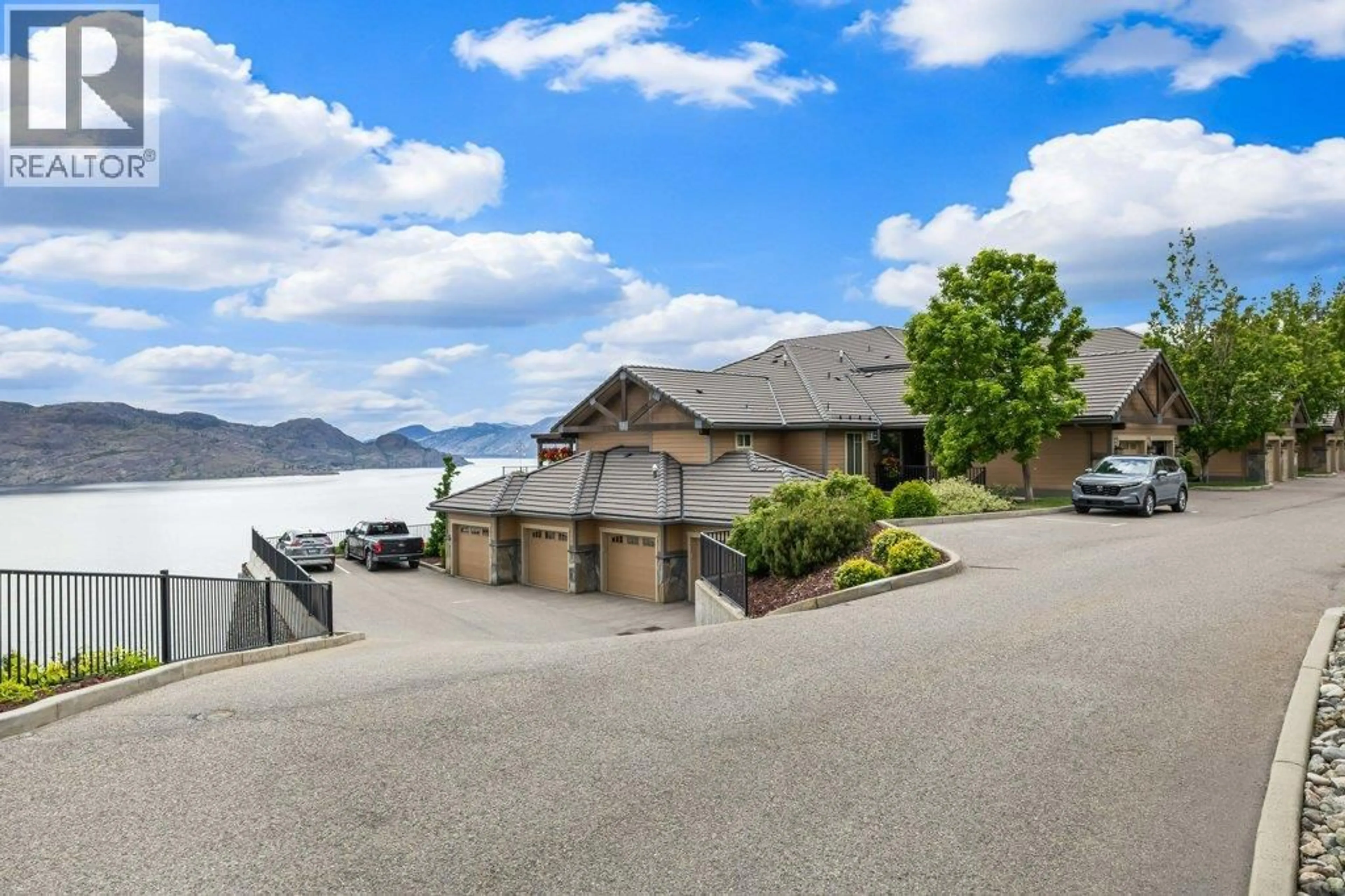 A pic from outside/outdoor area/front of a property/back of a property/a pic from drone, water/lake/river/ocean view for 143 - 4350 PONDEROSA DRIVE, Peachland British Columbia V0H1X5