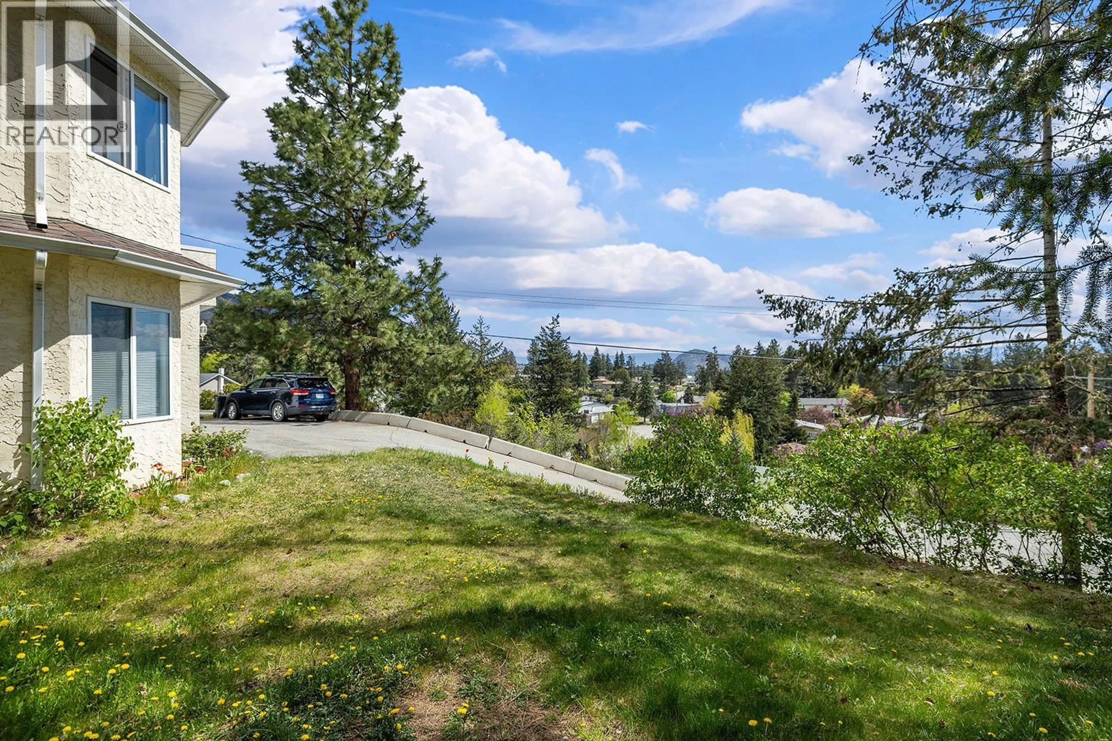 A pic from outside/outdoor area/front of a property/back of a property/a pic from drone, unknown for 3412 MCIVER ROAD, West Kelowna British Columbia V4T1H7