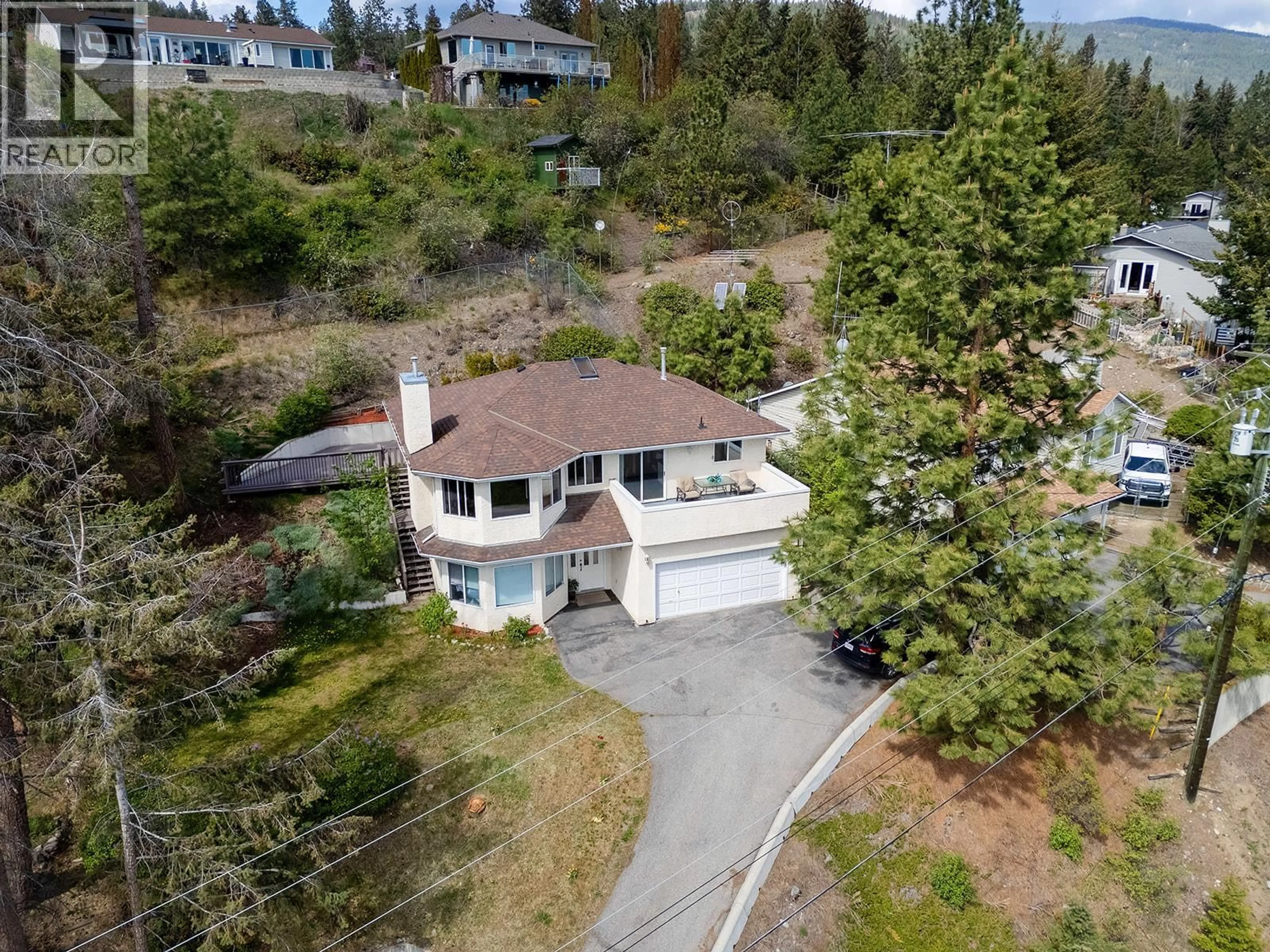 A pic from outside/outdoor area/front of a property/back of a property/a pic from drone, unknown for 3412 MCIVER ROAD, West Kelowna British Columbia V4T1H7