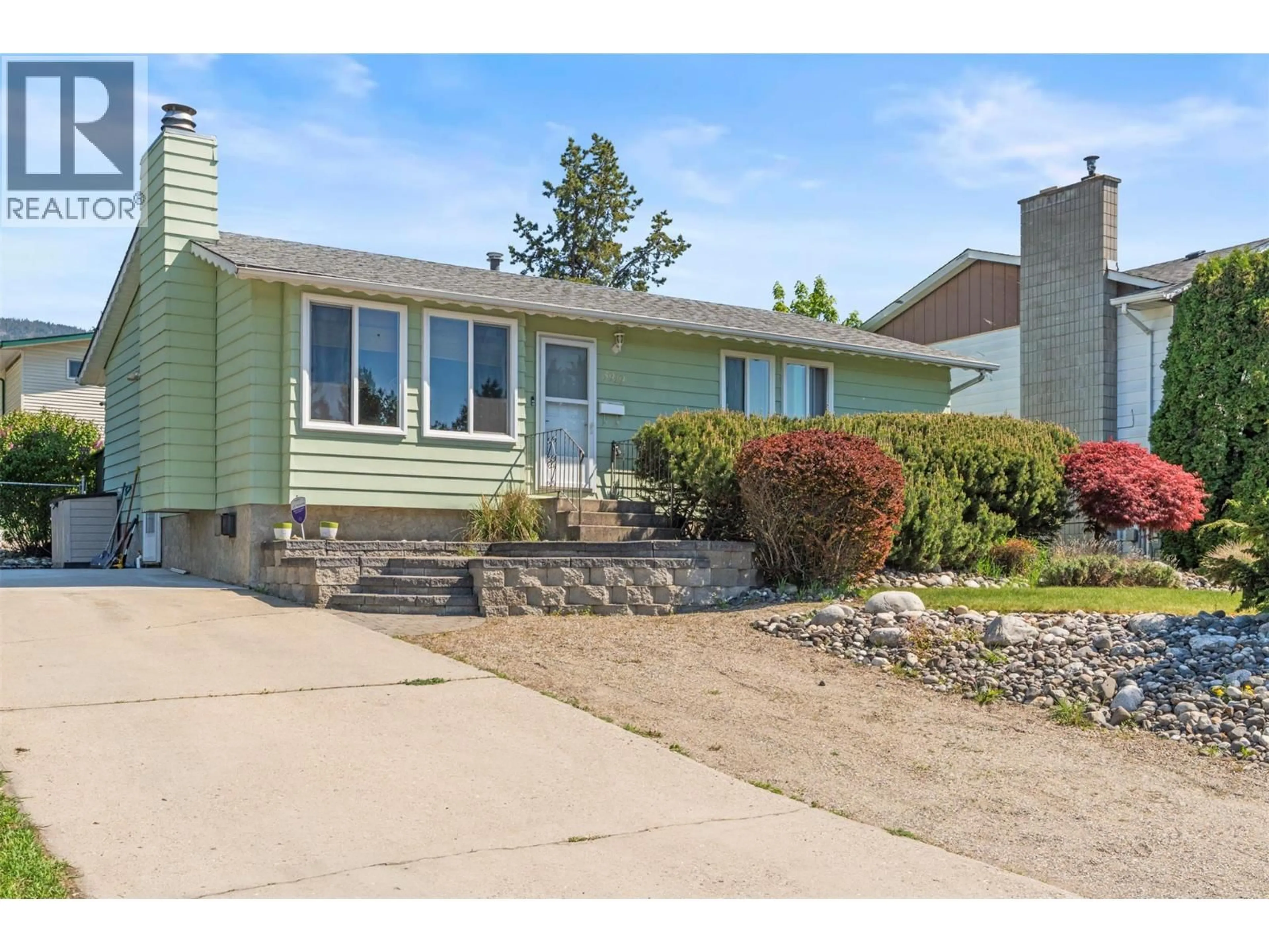 Home with vinyl exterior material, street for 3919 14 STREET, Vernon British Columbia V1T7N3