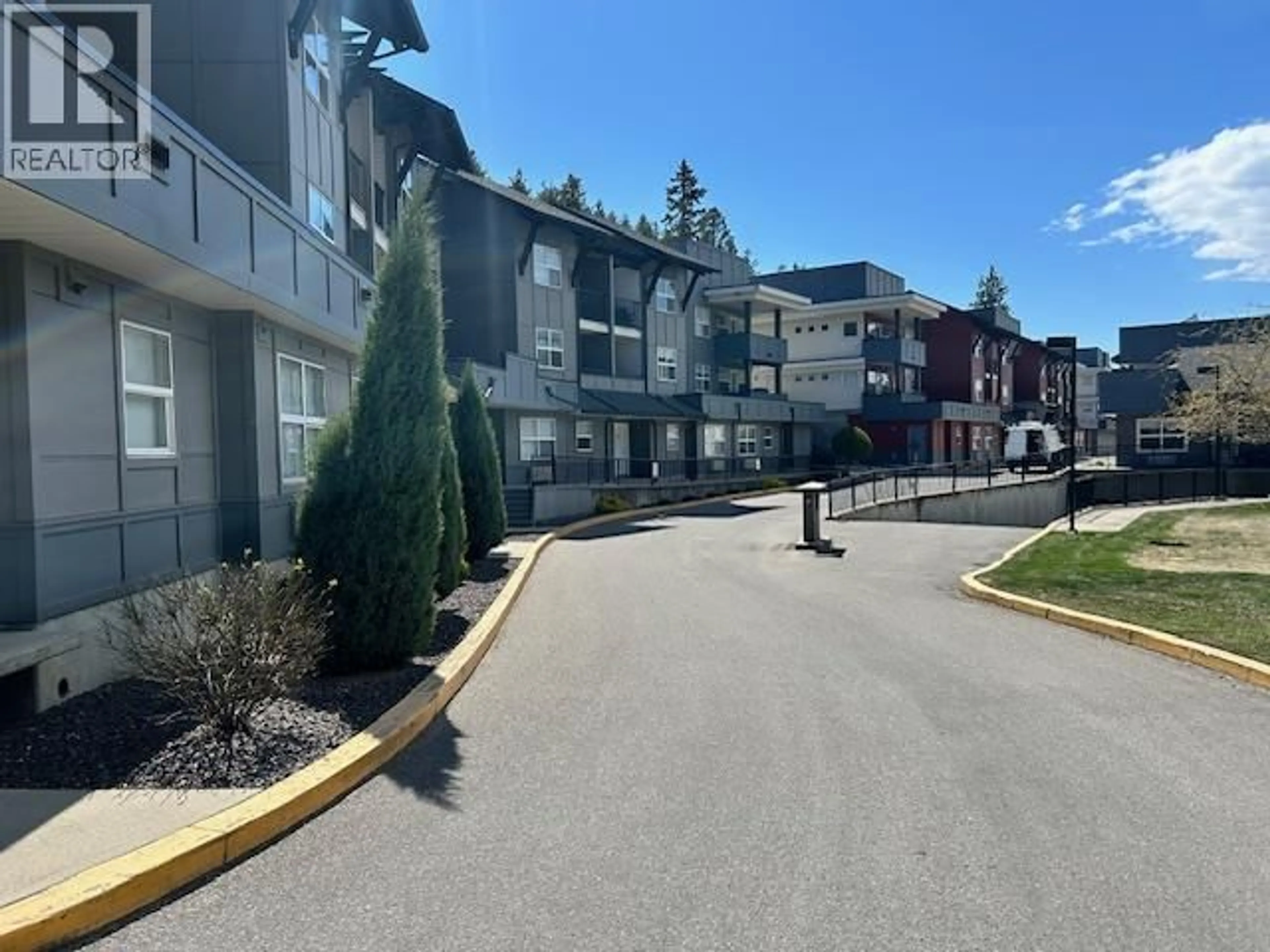 A pic from outside/outdoor area/front of a property/back of a property/a pic from drone, mountain view for 308 - 1483 GLENMORE ROAD, Kelowna British Columbia V1V2C5