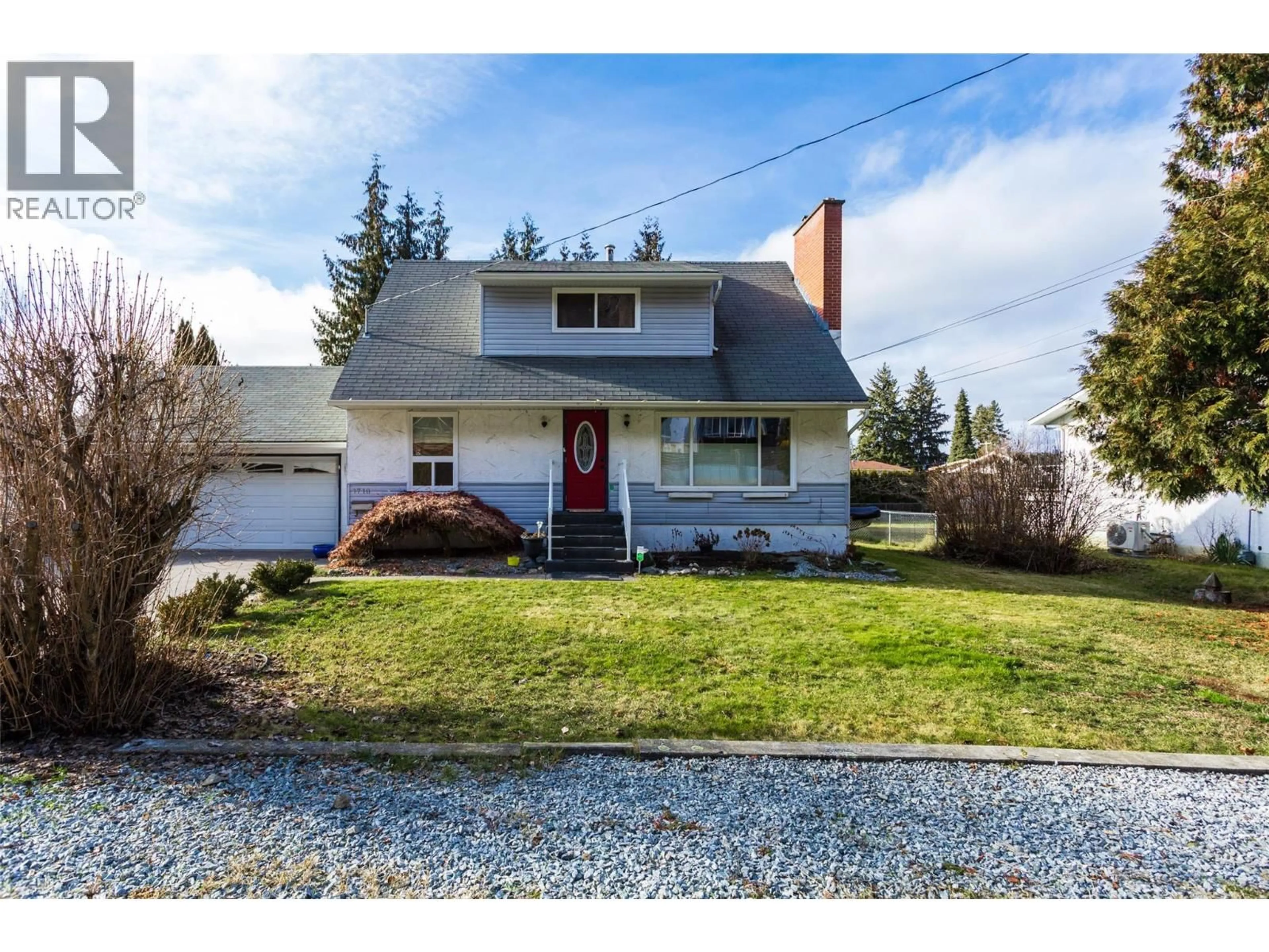 Home with vinyl exterior material, street for 1710 HOLLYWOOD ROAD SOUTH, Kelowna British Columbia V1X4P3