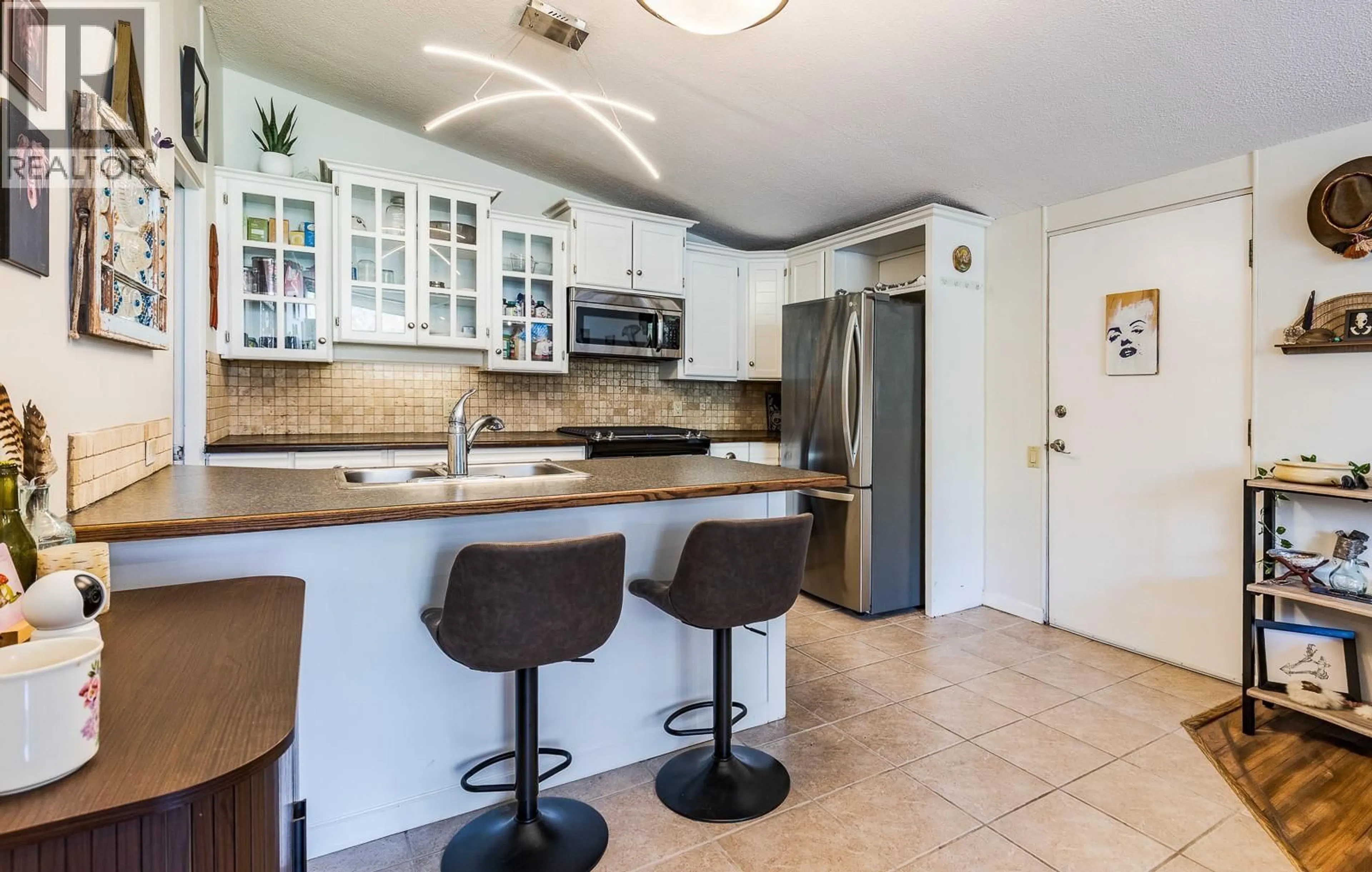 Open concept kitchen, ceramic/tile floor for 11 - 353 BOYCE CRESCENT, Kelowna British Columbia V1Y5Z7