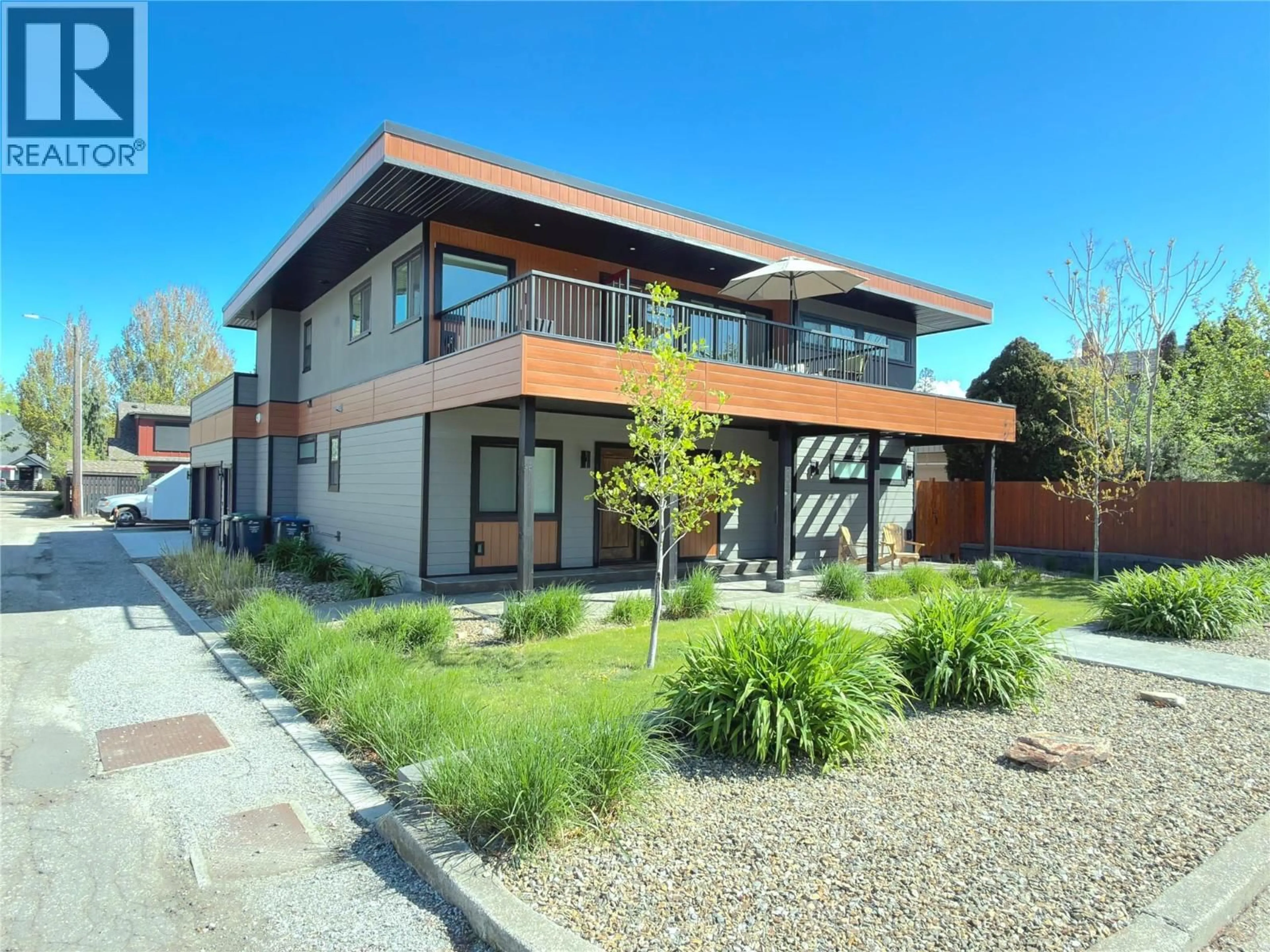 Home with brick exterior material, street for 338 BURNE AVENUE, Kelowna British Columbia V1Y5P1