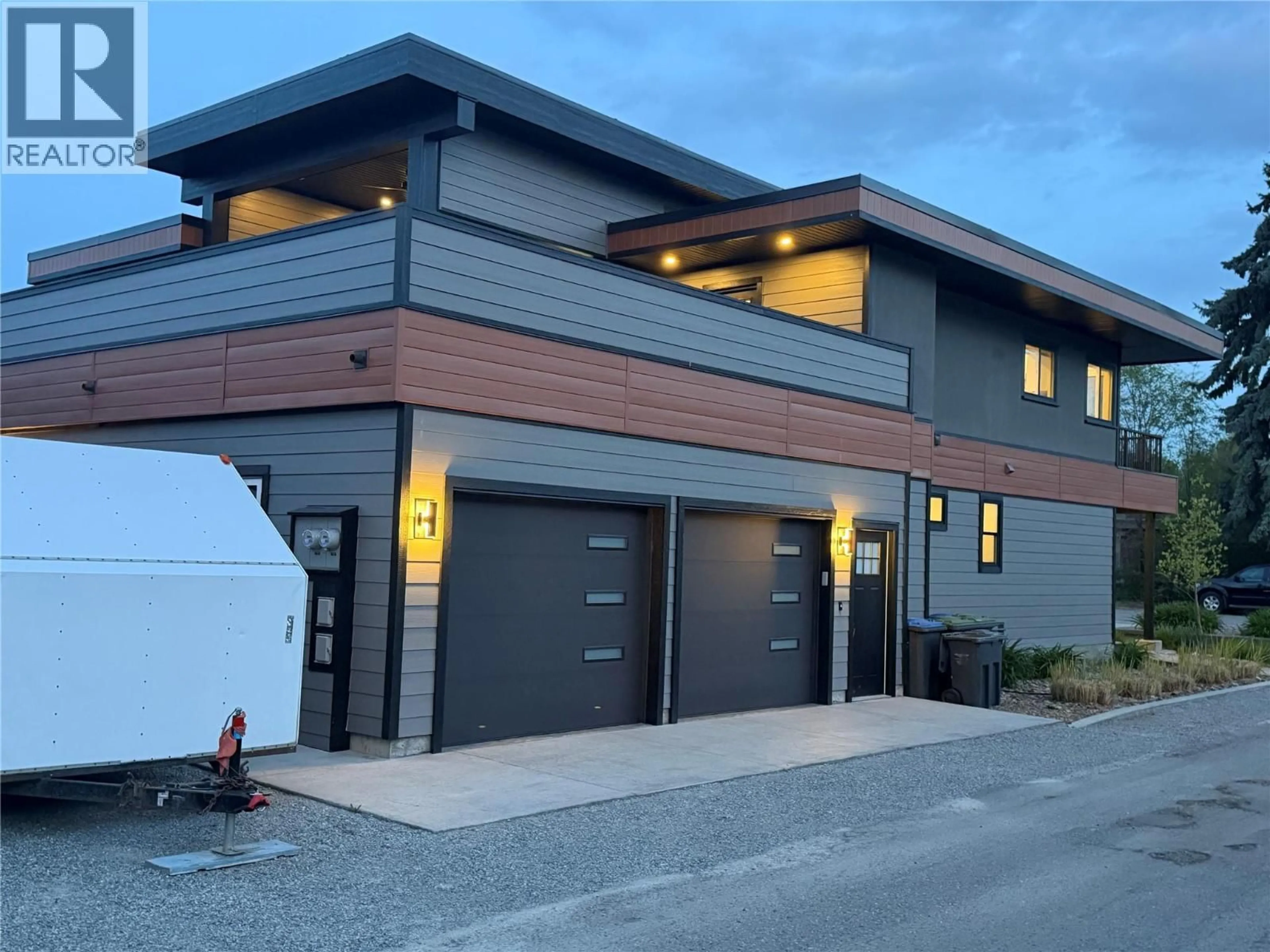 Home with vinyl exterior material, street for 338 BURNE AVENUE, Kelowna British Columbia V1Y5P1