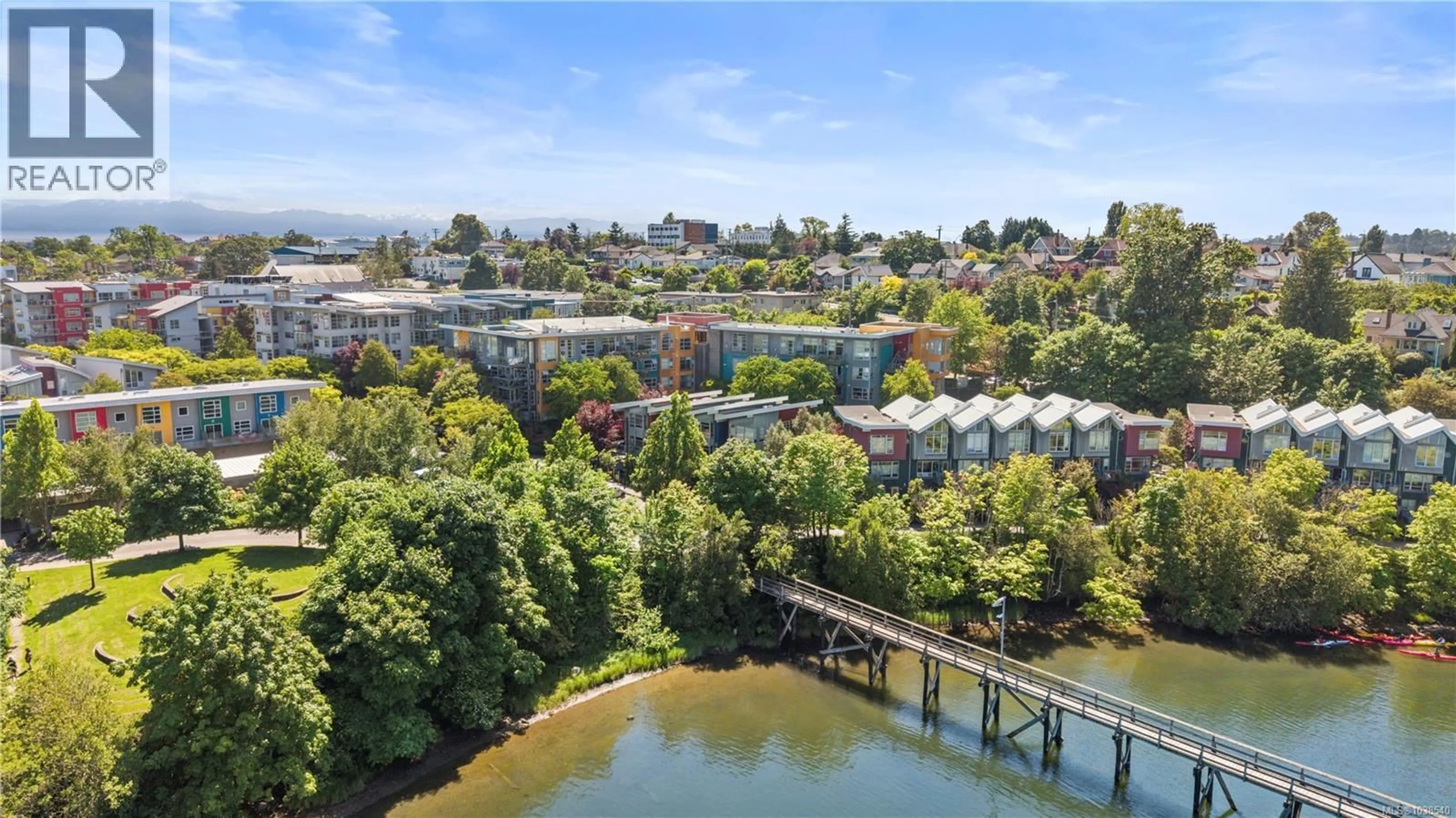 A pic from outside/outdoor area/front of a property/back of a property/a pic from drone, water/lake/river/ocean view for 406 - 90 REGATTA LANDING, Victoria British Columbia V9A7R2