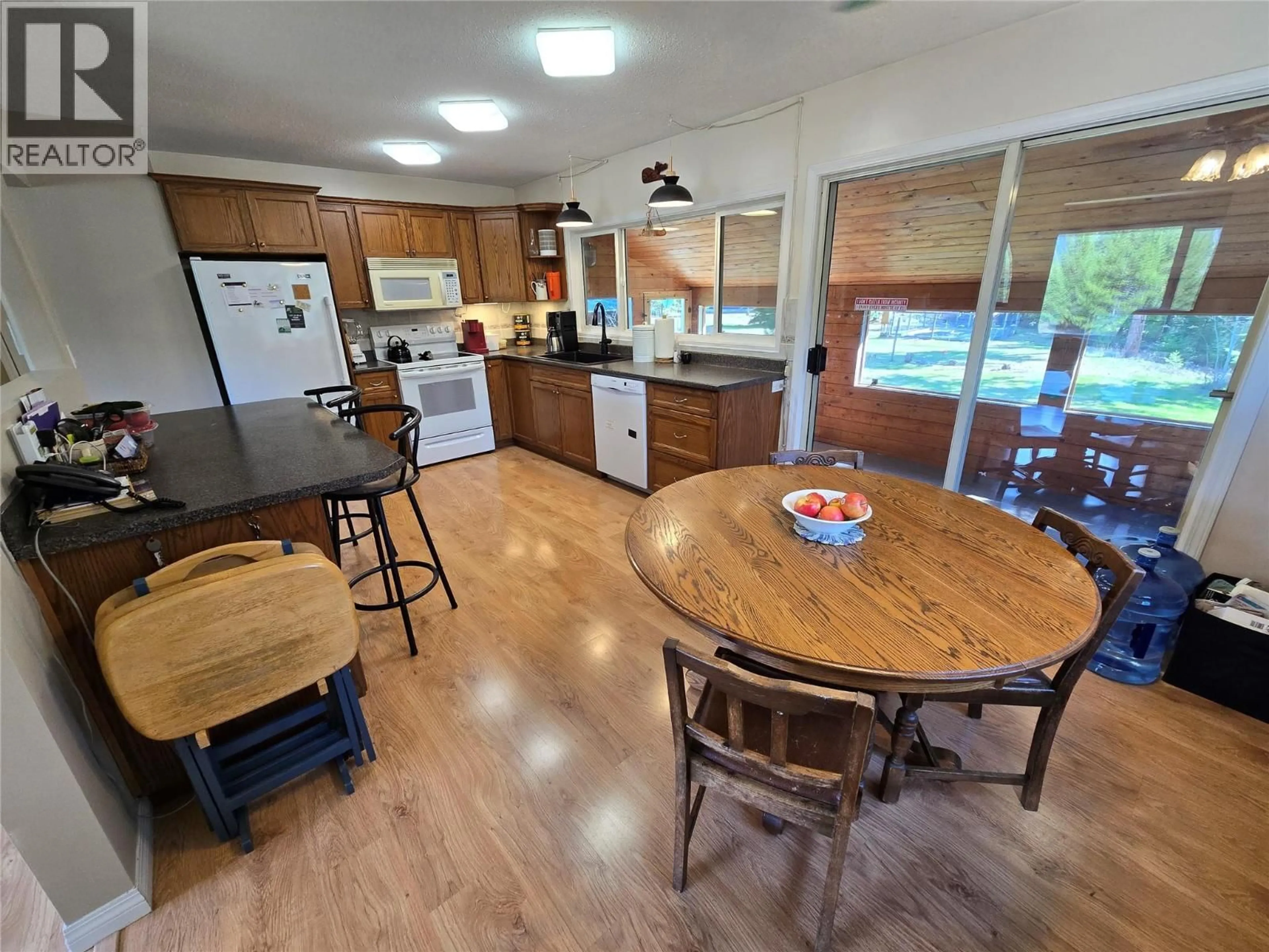 Open concept kitchen, wood/laminate floor for 1032 CAROLINE ROAD, Clearwater British Columbia V0E1N2