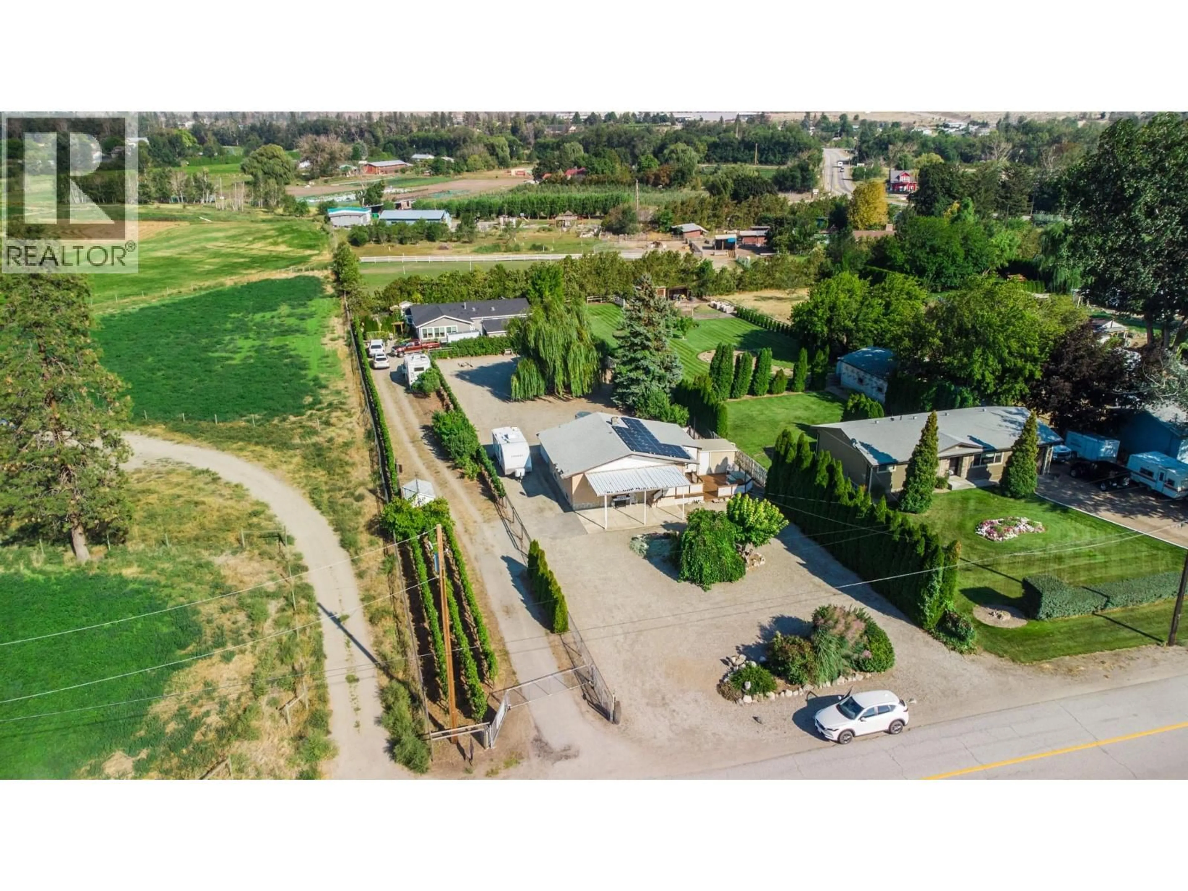 A pic from outside/outdoor area/front of a property/back of a property/a pic from drone, street for 156 SECREST HILL ROAD, Oliver British Columbia V0H1T5