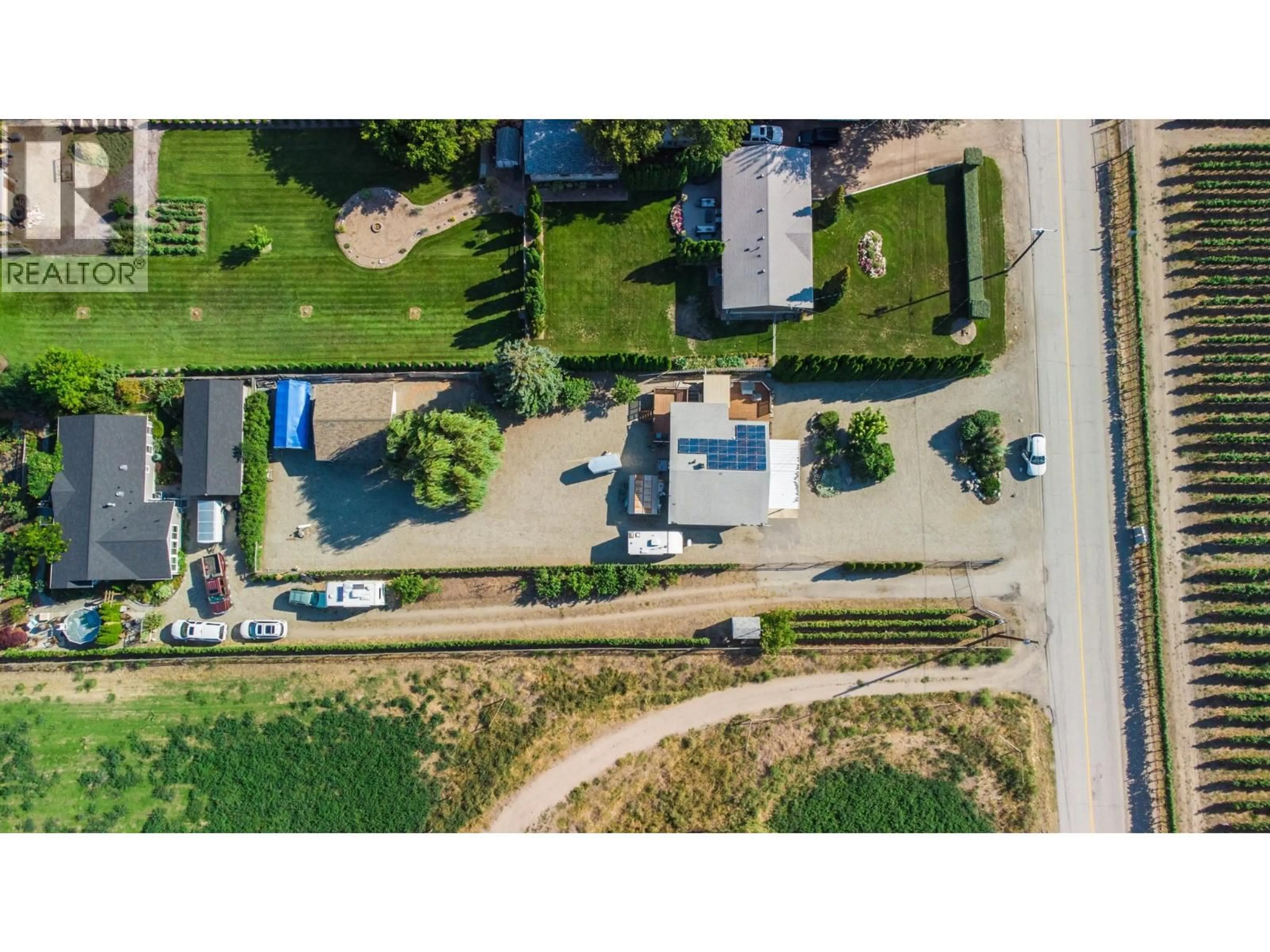 A pic from outside/outdoor area/front of a property/back of a property/a pic from drone, street for 156 SECREST HILL ROAD, Oliver British Columbia V0H1T5