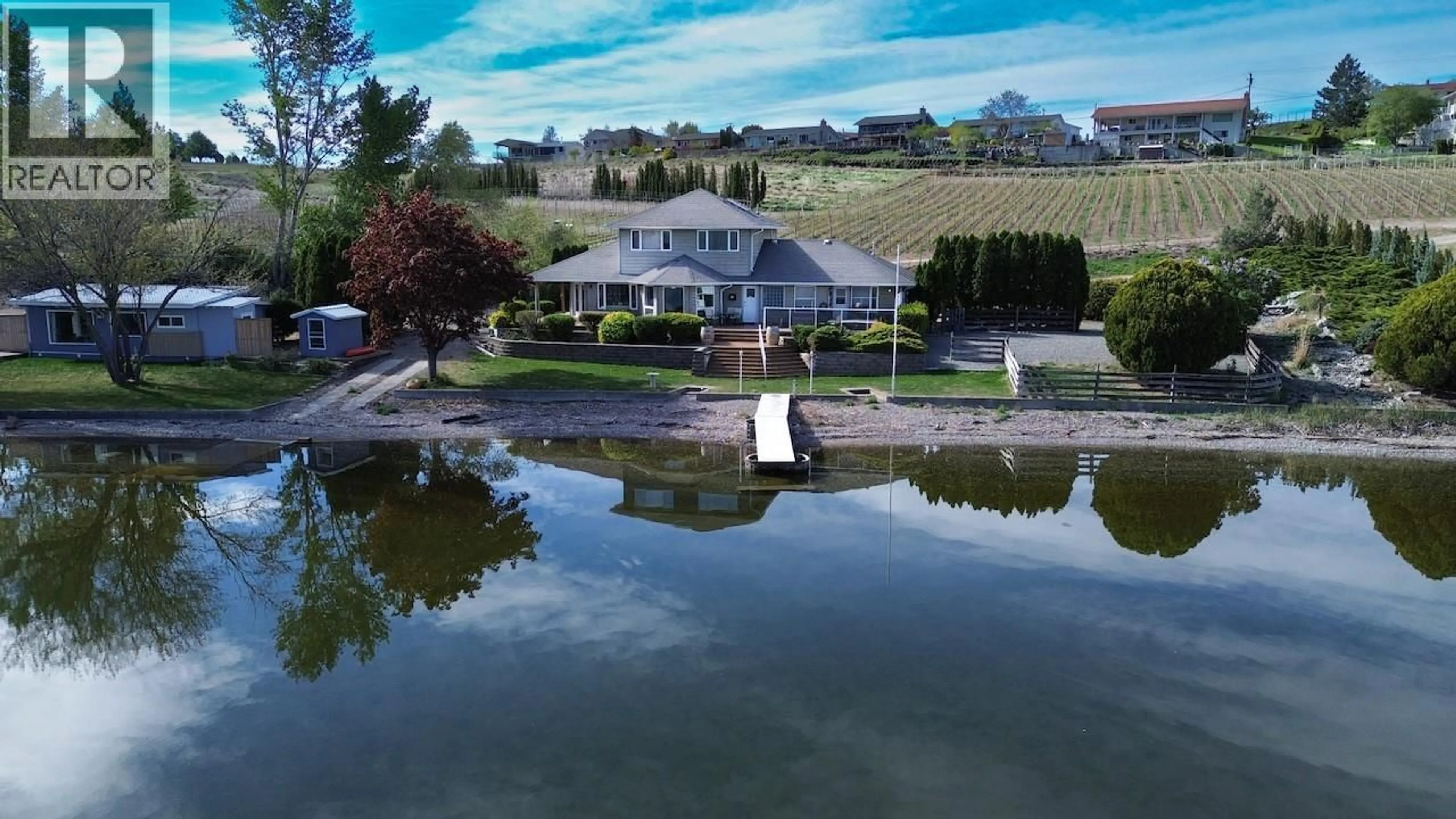 A pic from outside/outdoor area/front of a property/back of a property/a pic from drone, water/lake/river/ocean view for 8405 104TH AVENUE, Osoyoos British Columbia V0H1V2