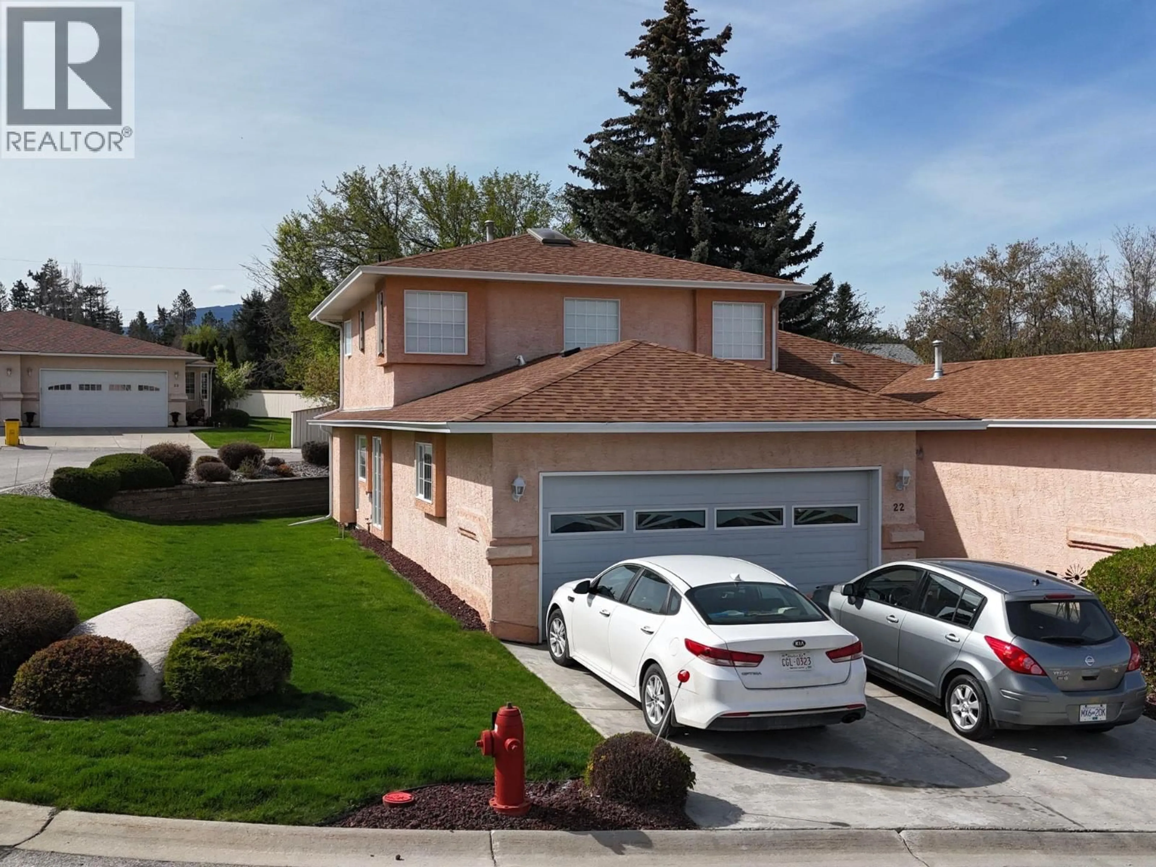 Home with vinyl exterior material, street for 22 - 617 27TH AVENUE SOUTH, Cranbrook British Columbia V1C6L1