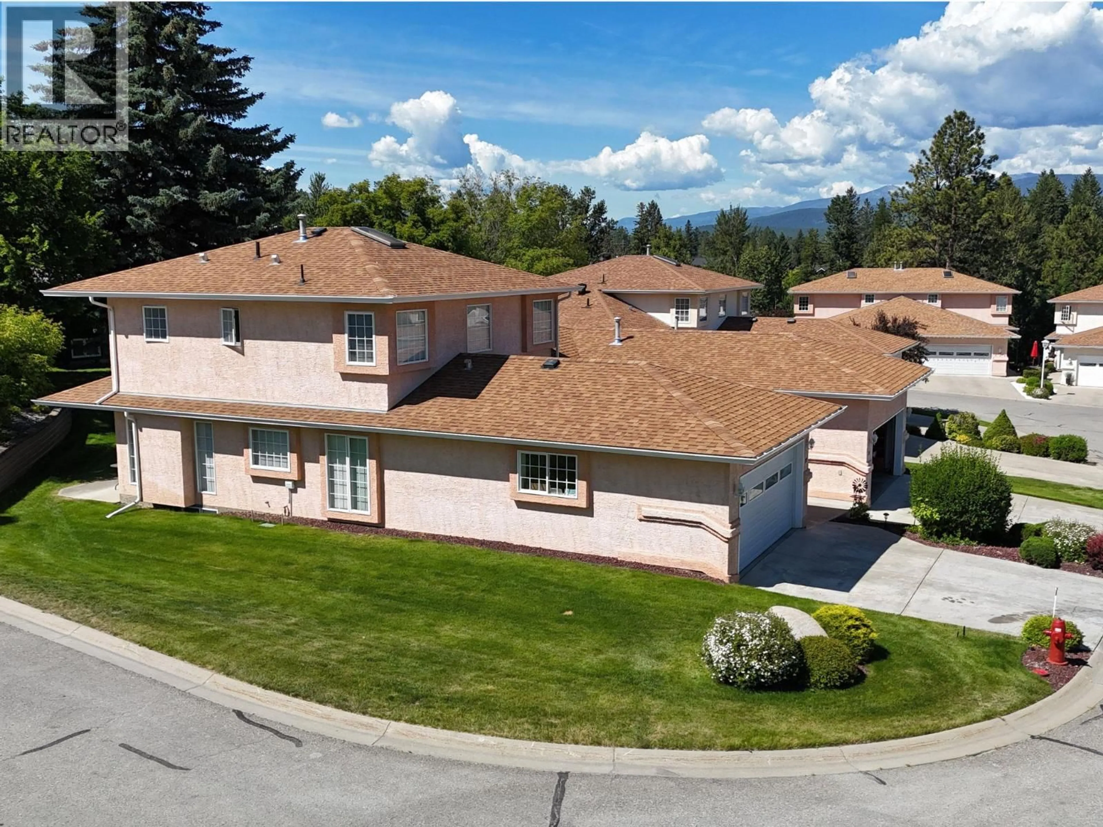 A pic from outside/outdoor area/front of a property/back of a property/a pic from drone, mountain view for 22 - 617 27TH AVENUE SOUTH, Cranbrook British Columbia V1C6L1