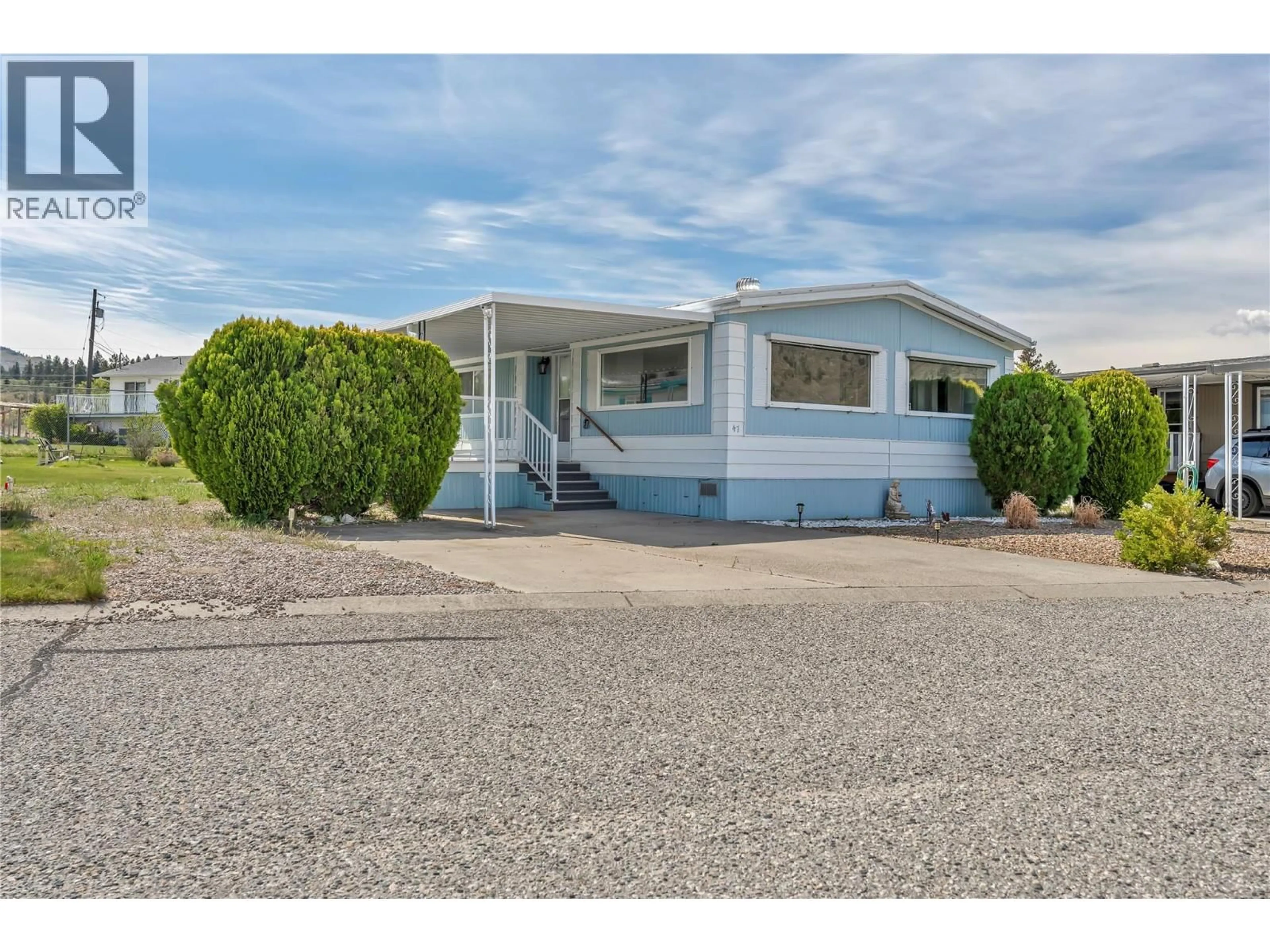Home with vinyl exterior material, street for 47 - 6601 TUCELNUIT ROAD, Oliver British Columbia V0H1T3