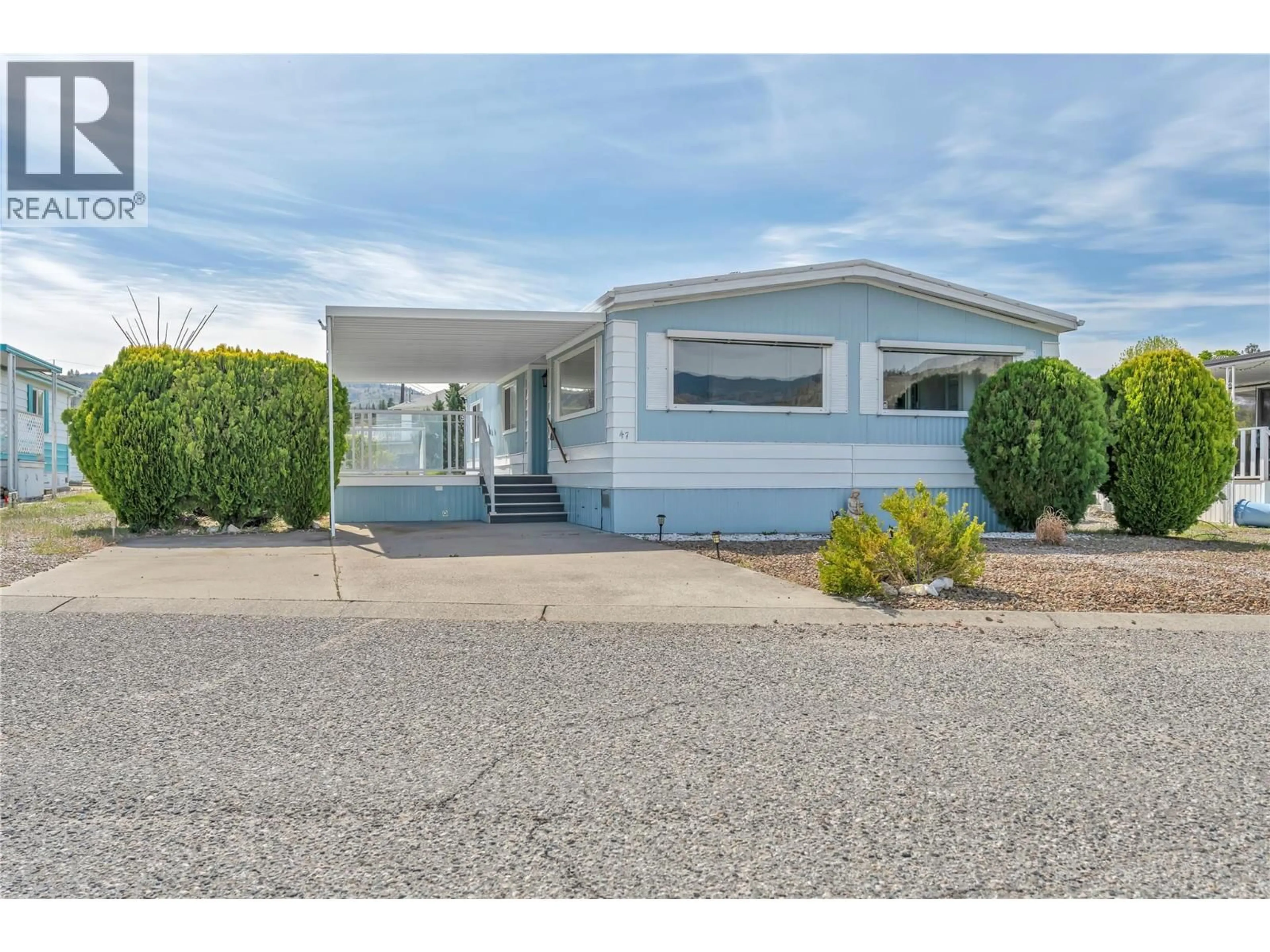 Home with vinyl exterior material, street for 47 - 6601 TUCELNUIT ROAD, Oliver British Columbia V0H1T3