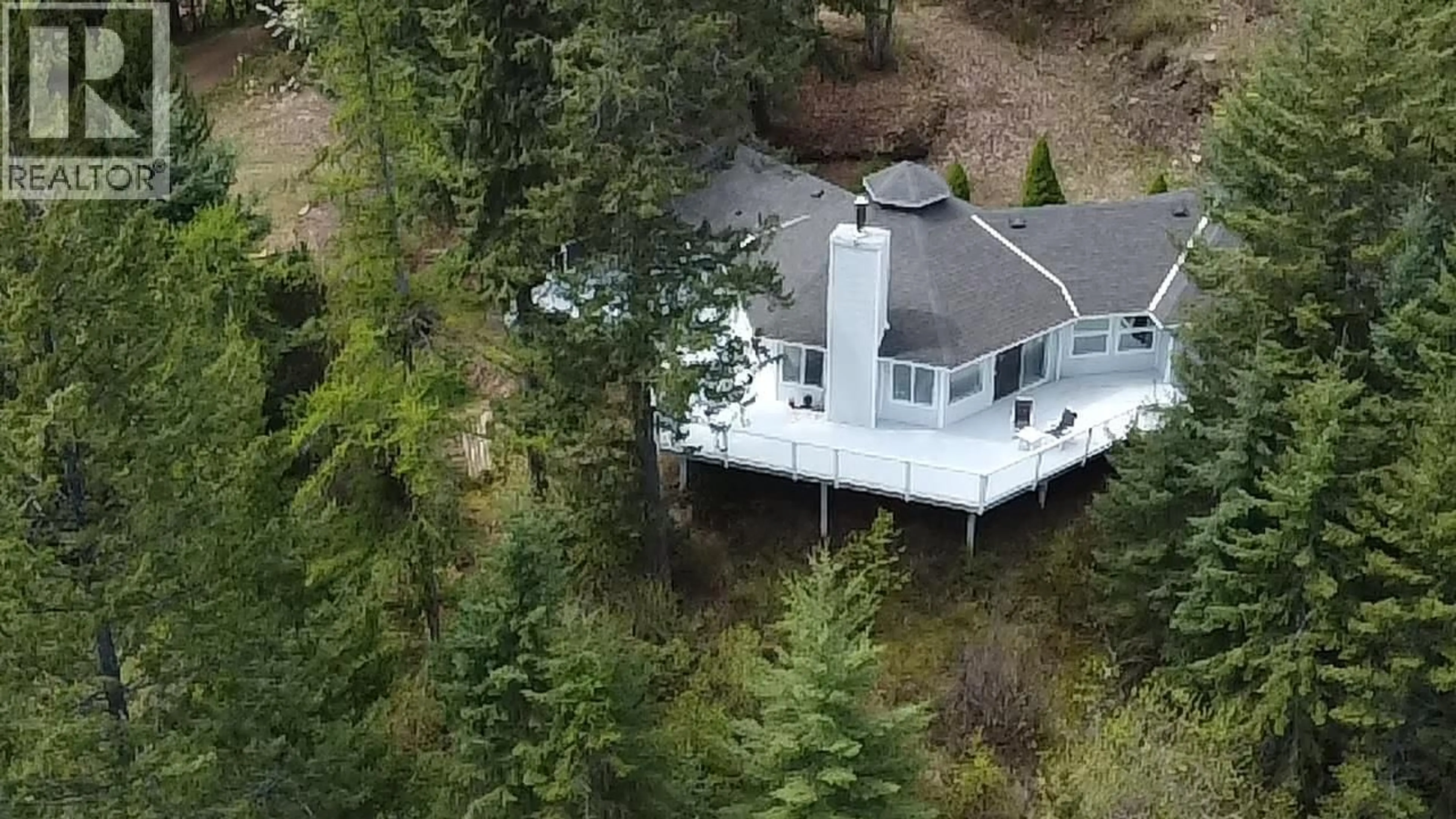 A pic from outside/outdoor area/front of a property/back of a property/a pic from drone, forest/trees view for 5864 MORGAN DRIVE, Kaslo British Columbia V0G1M0