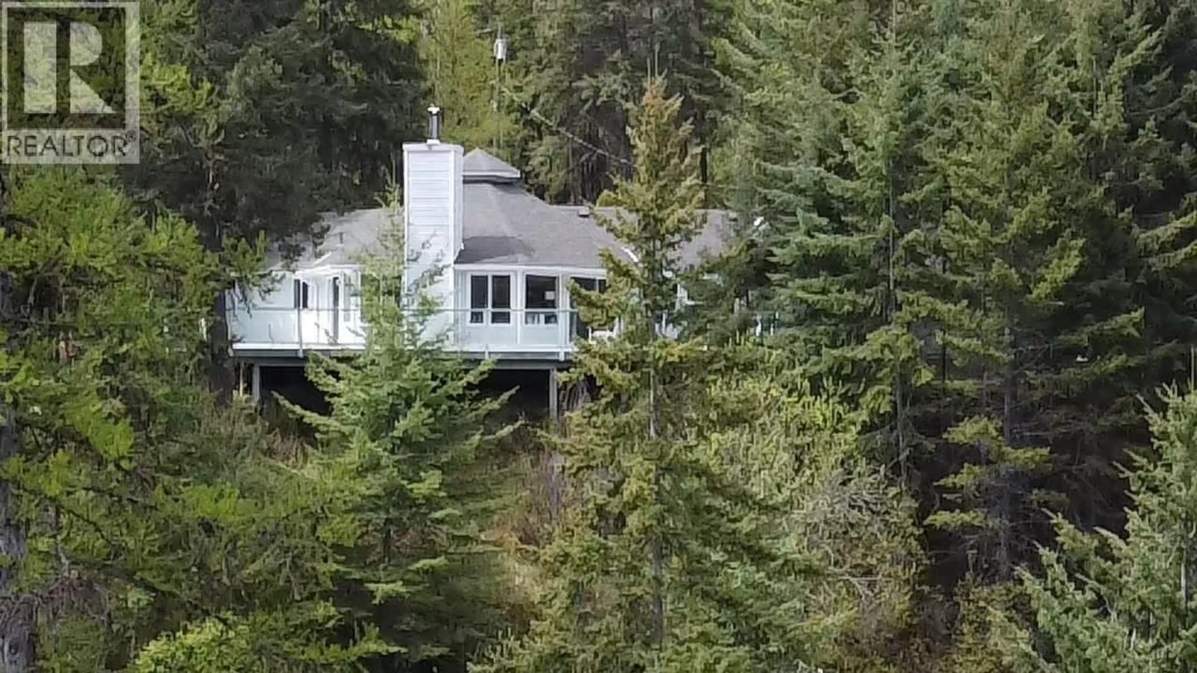 A pic from outside/outdoor area/front of a property/back of a property/a pic from drone, forest/trees view for 5864 MORGAN DRIVE, Kaslo British Columbia V0G1M0