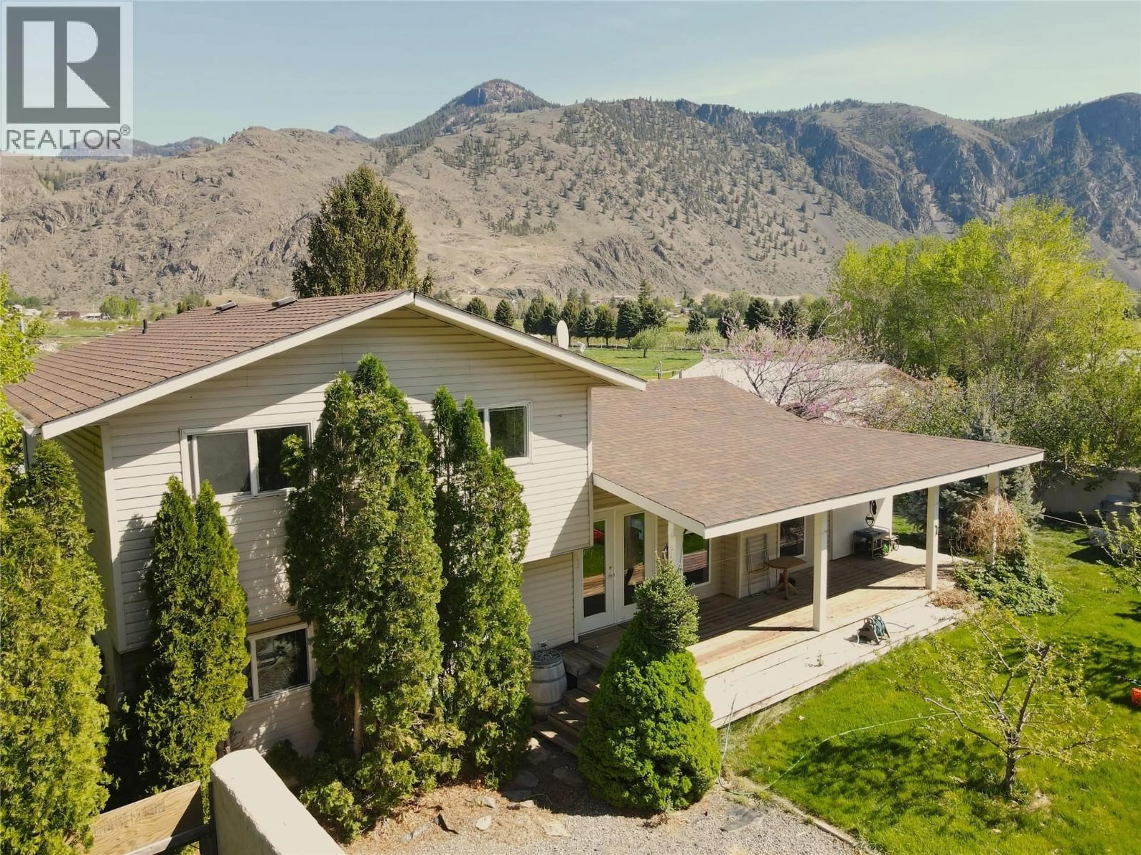 A pic from outside/outdoor area/front of a property/back of a property/a pic from drone, mountain view for 2626 HIGHWAY 3 OTHER, Keremeos British Columbia V0X1N5