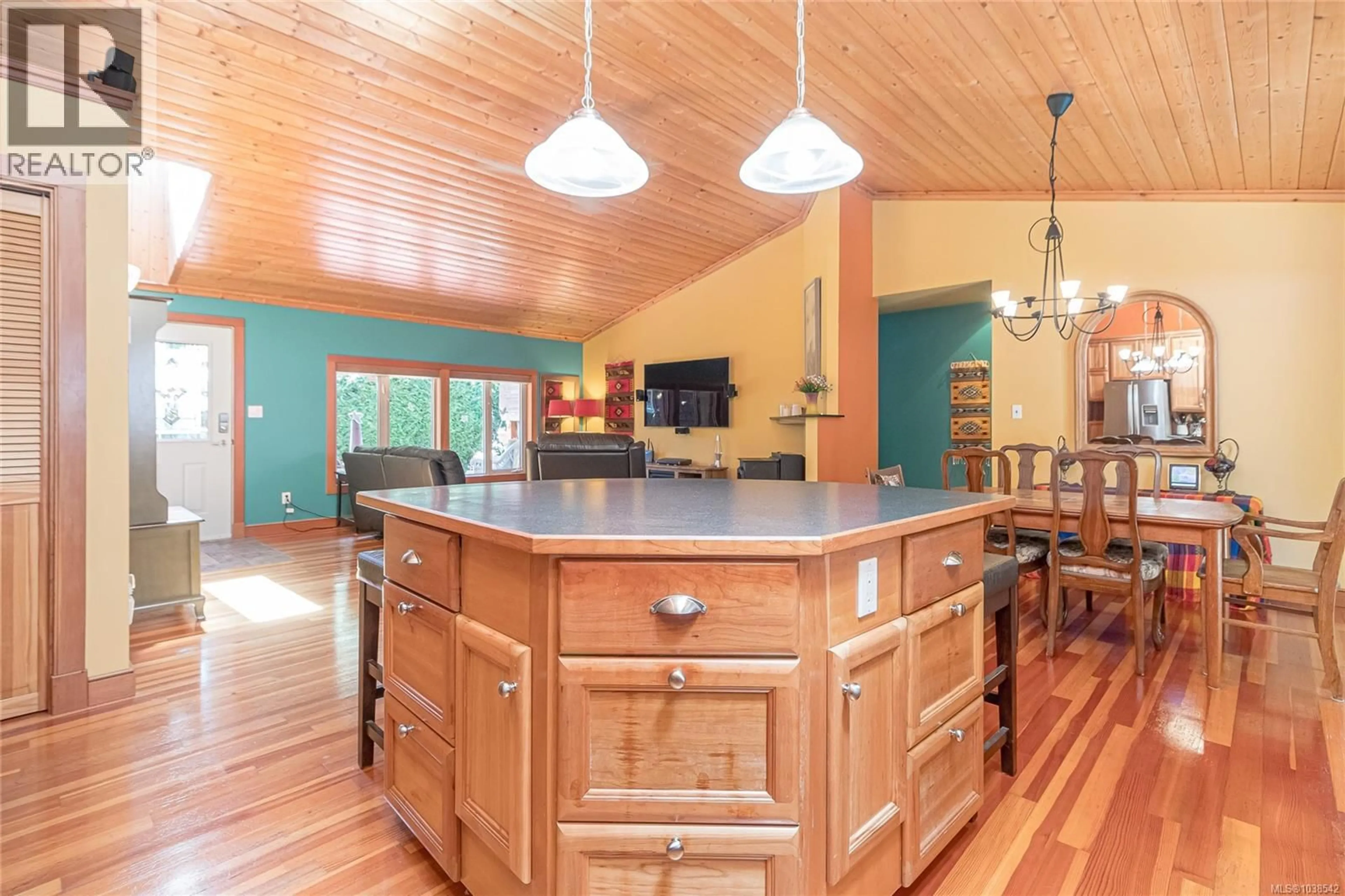Open concept kitchen, wood/laminate floor for 4611 BERBERS DRIVE, Bowser British Columbia V0R1G0