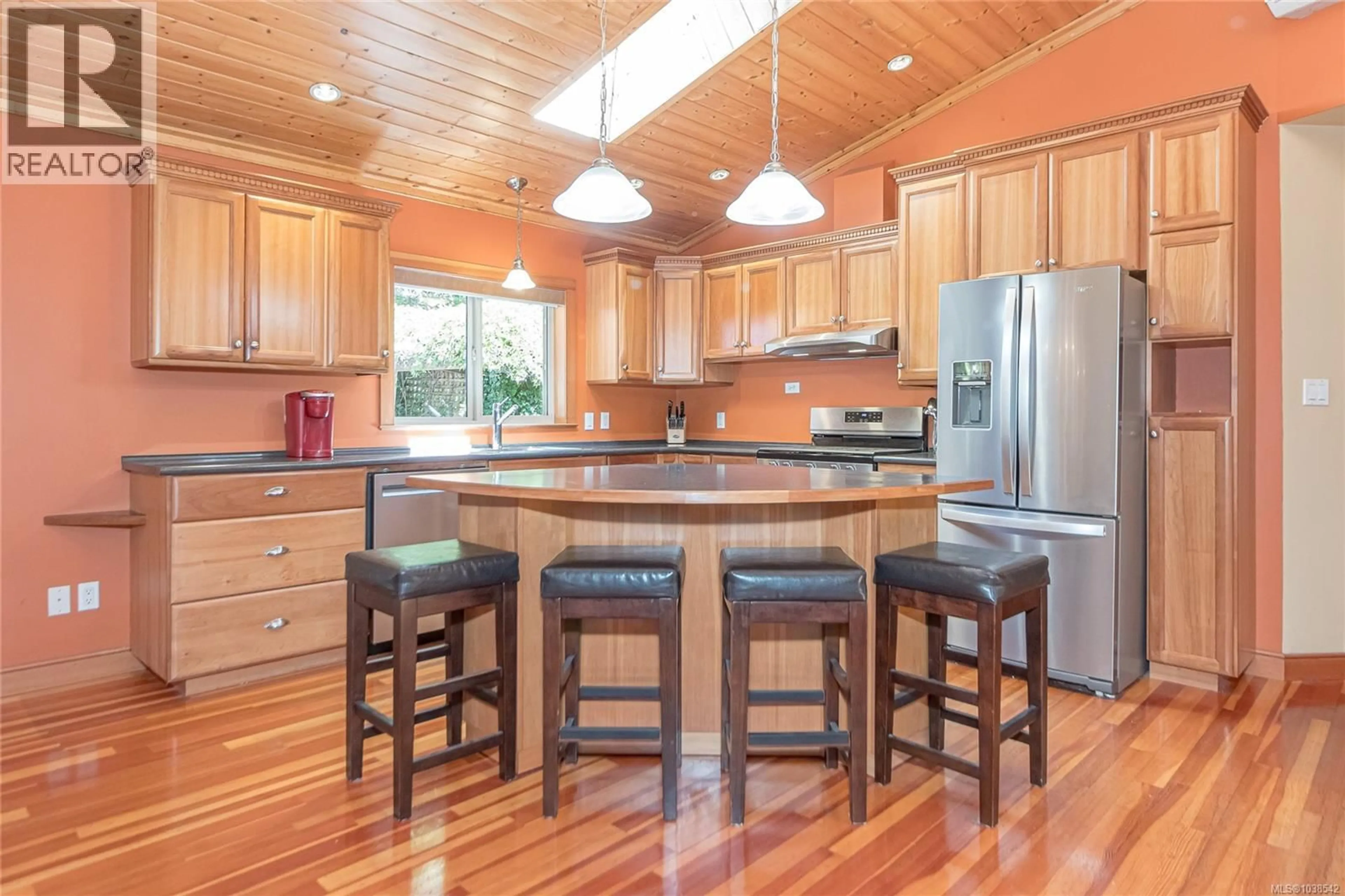 Open concept kitchen, wood/laminate floor for 4611 BERBERS DRIVE, Bowser British Columbia V0R1G0