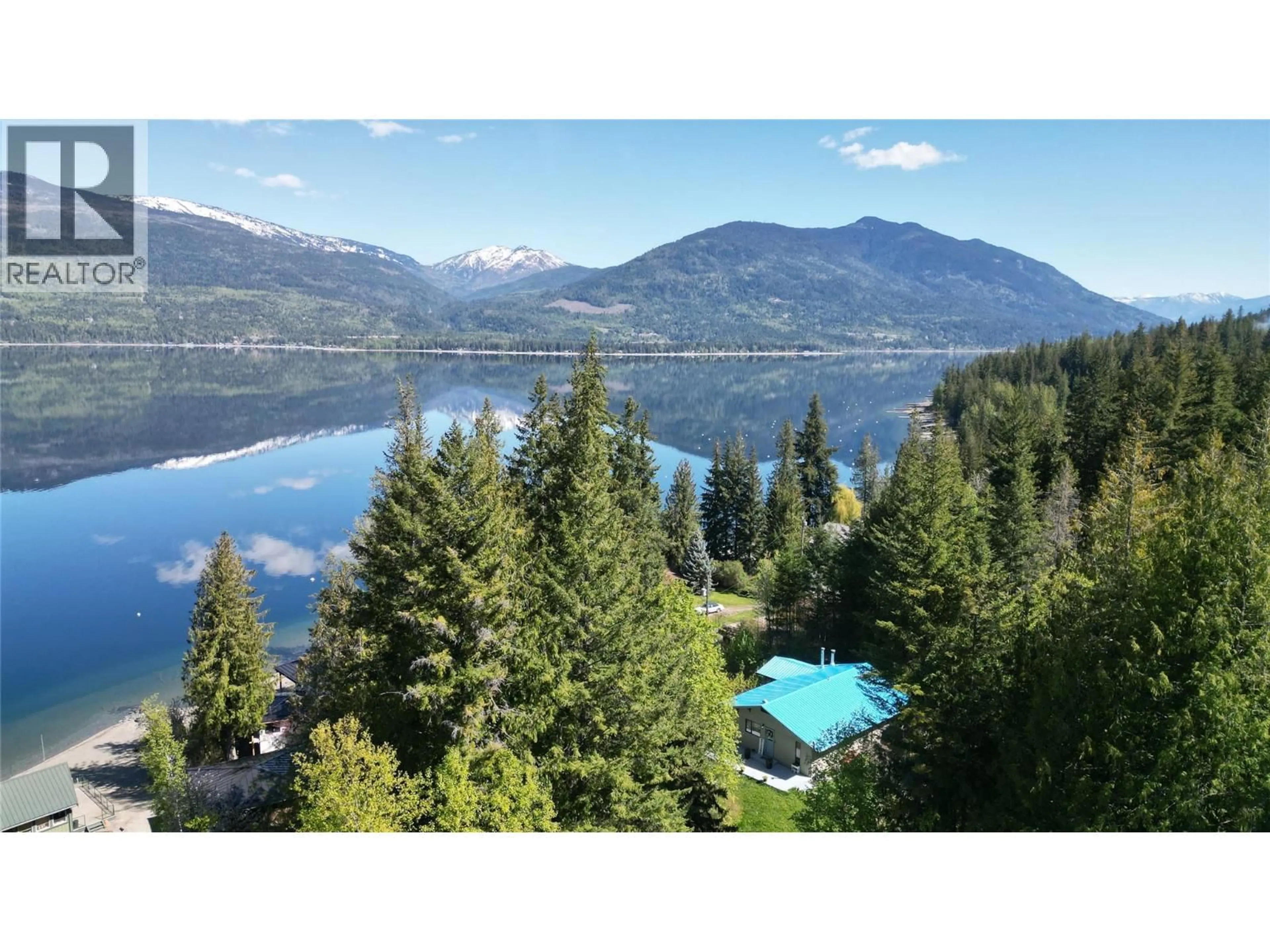 A pic from outside/outdoor area/front of a property/back of a property/a pic from drone, water/lake/river/ocean view for 4265 EAGLE BAY ROAD, Eagle Bay British Columbia V0E1T0