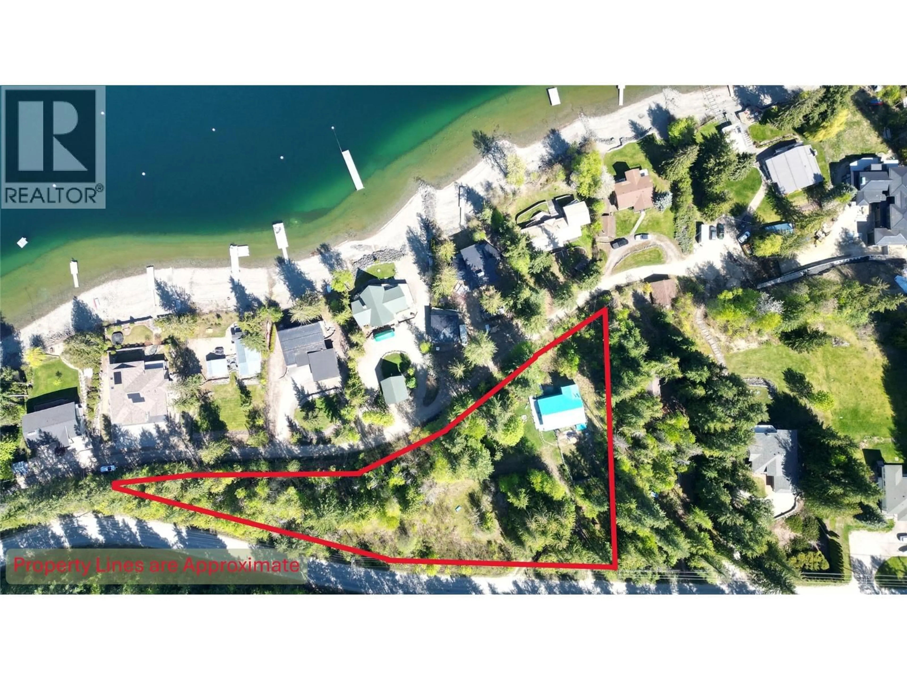 A pic from outside/outdoor area/front of a property/back of a property/a pic from drone, water/lake/river/ocean view for 4265 EAGLE BAY ROAD, Eagle Bay British Columbia V0E1T0