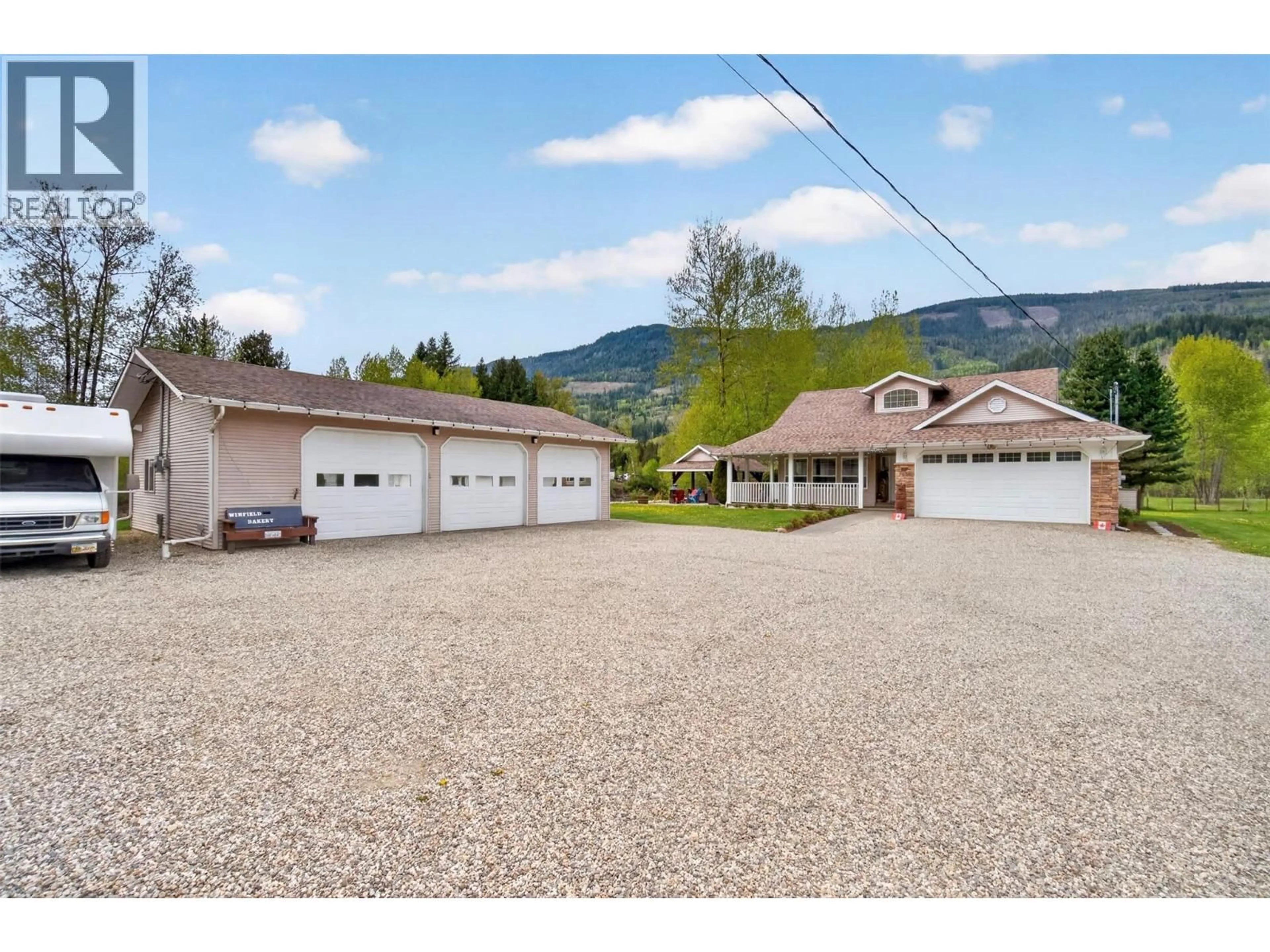 A pic from outside/outdoor area/front of a property/back of a property/a pic from drone, mountain view for 2069 SOLSQUA ROAD, Sicamous British Columbia V0E2V5
