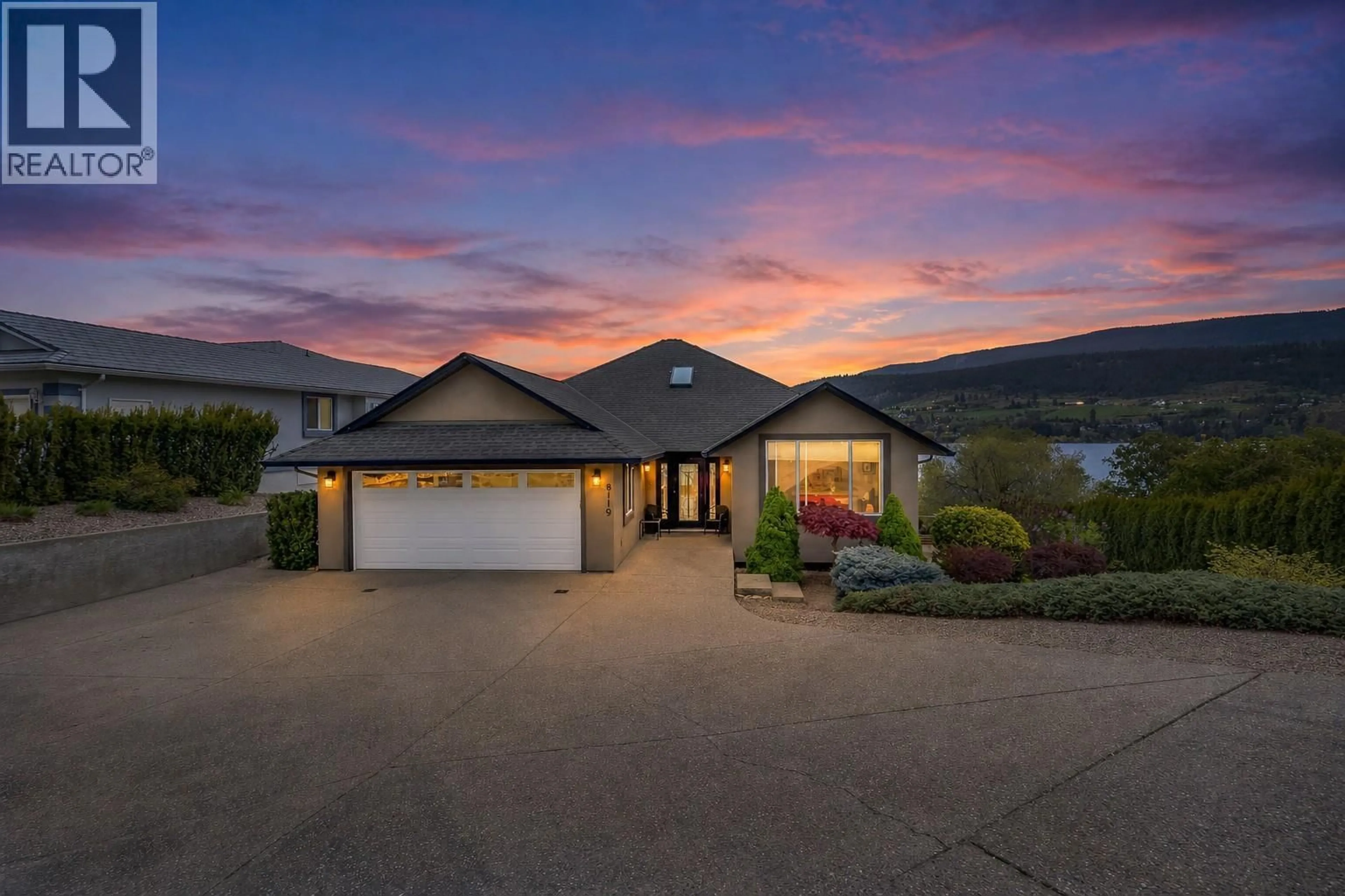 A pic from outside/outdoor area/front of a property/back of a property/a pic from drone, mountain view for 8119 STONERIDGE DRIVE, Coldstream British Columbia V1B2T8