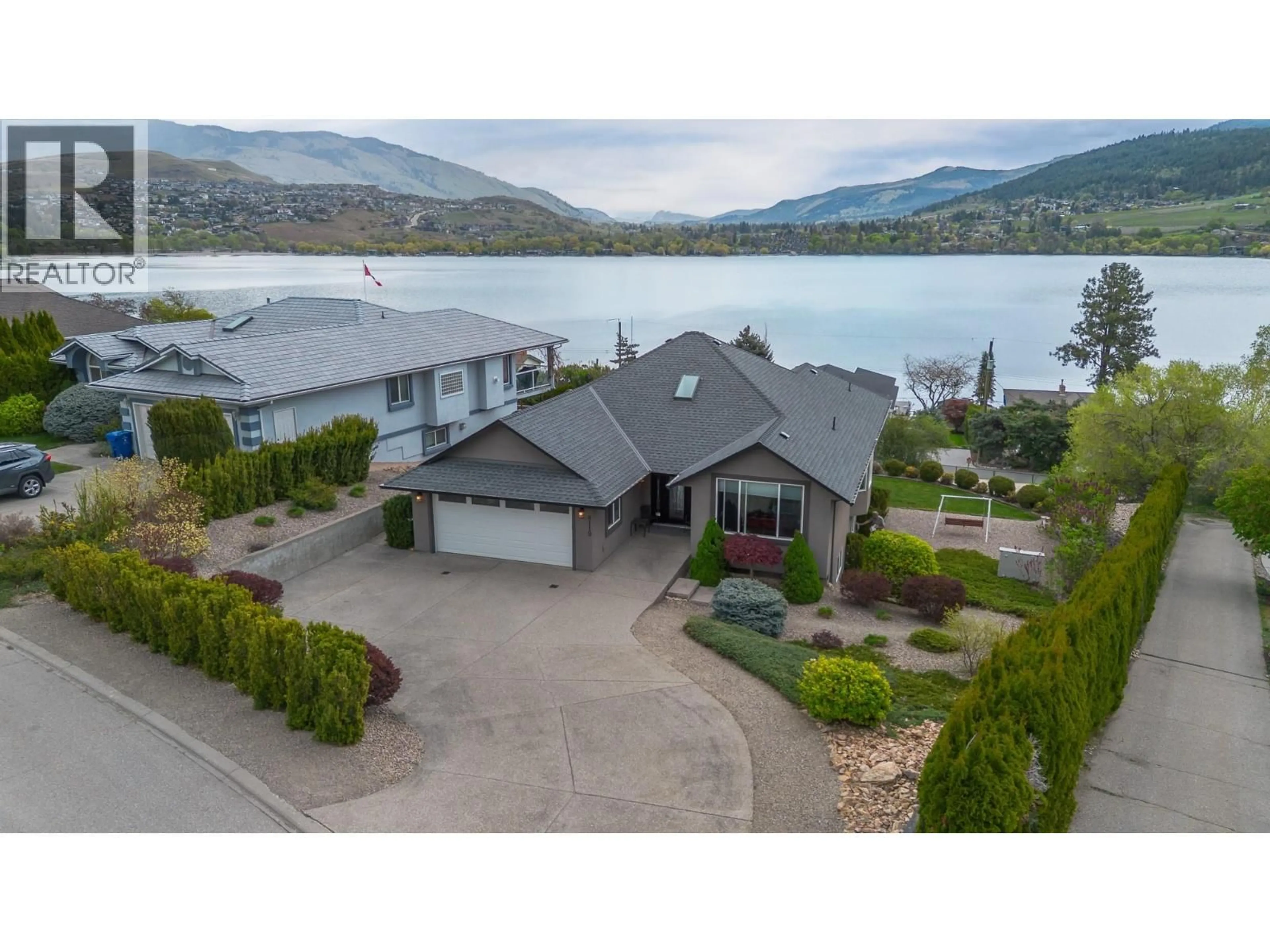 A pic from outside/outdoor area/front of a property/back of a property/a pic from drone, water/lake/river/ocean view for 8119 STONERIDGE DRIVE, Coldstream British Columbia V1B2T8