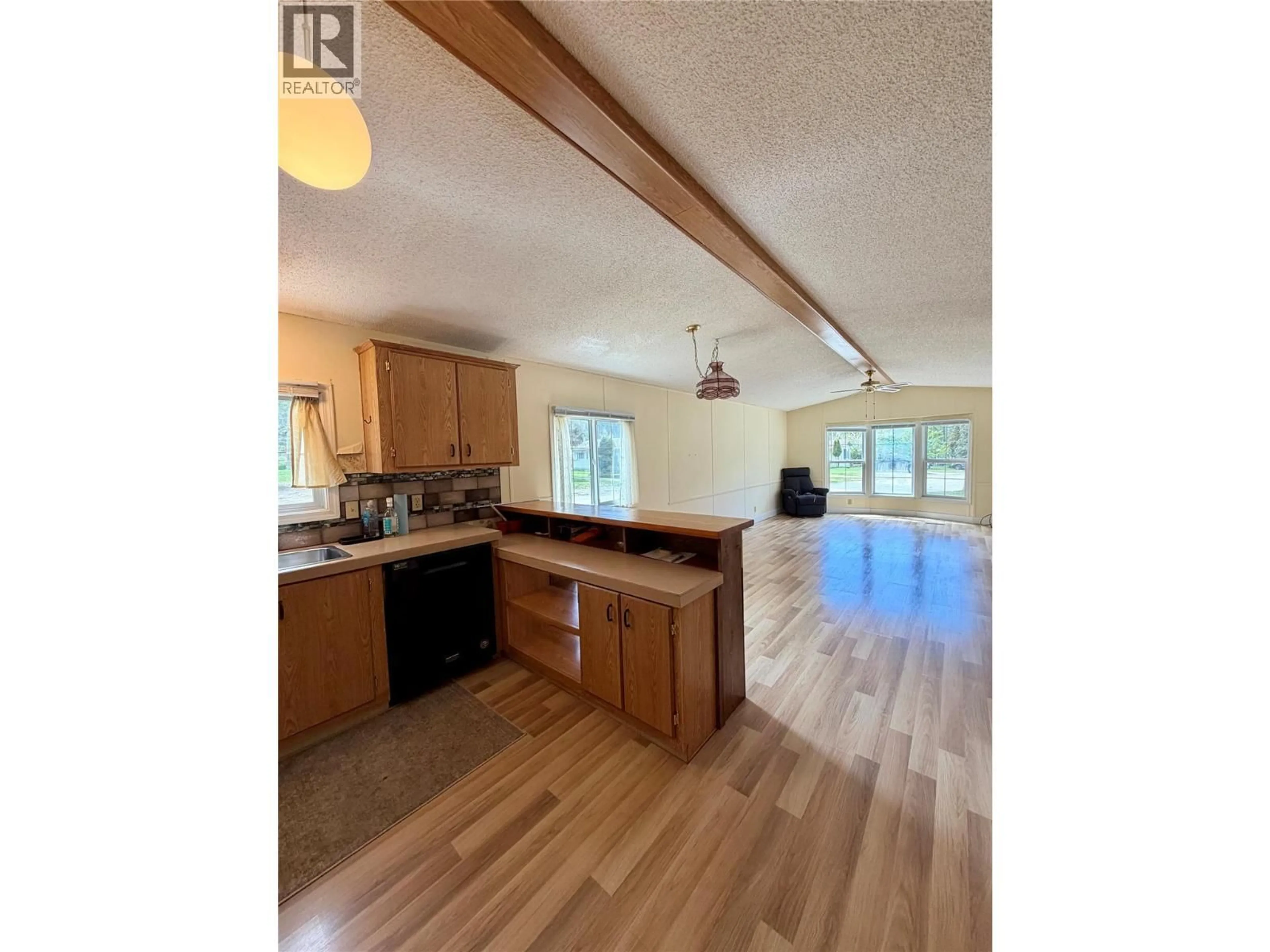 Open concept kitchen, wood/laminate floor for 13 - 2917 GEORAMA ROAD, Nelson British Columbia V1L6Y7
