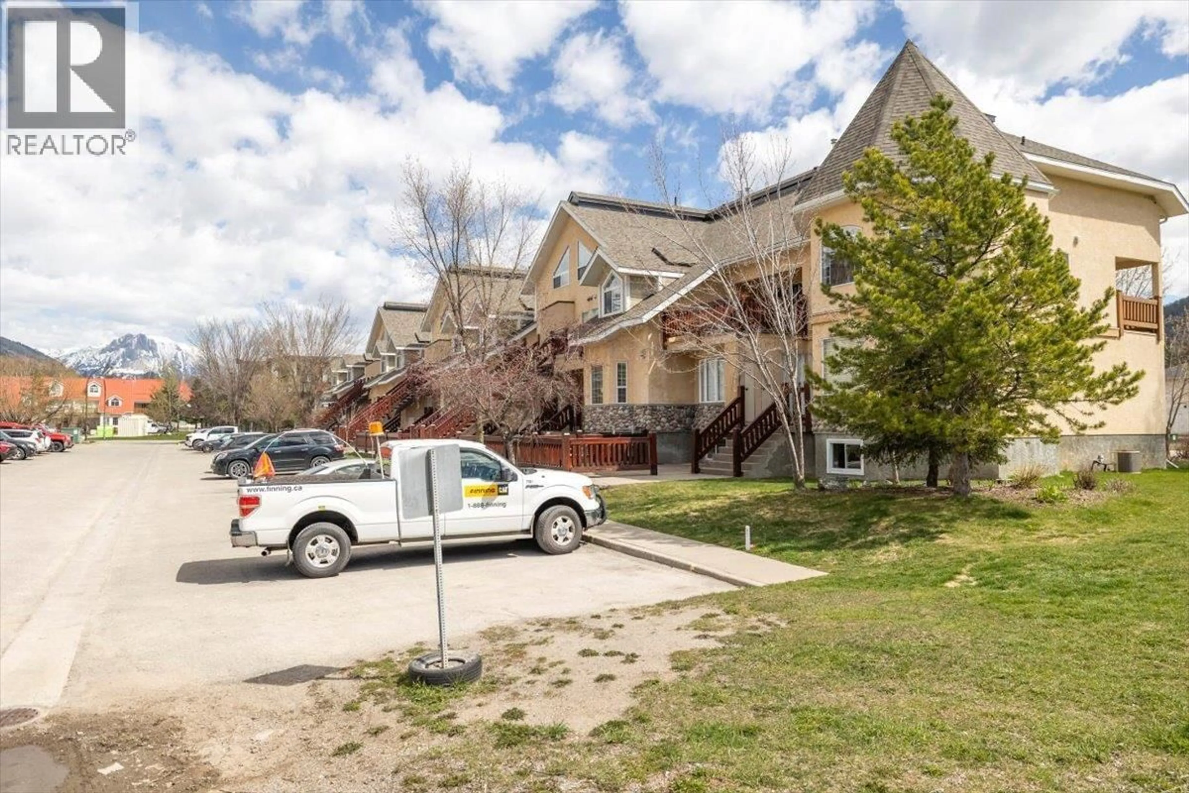 A pic from outside/outdoor area/front of a property/back of a property/a pic from drone, street for 1304 - 1300 RIVERSIDE WAY, Fernie British Columbia V0B1M7