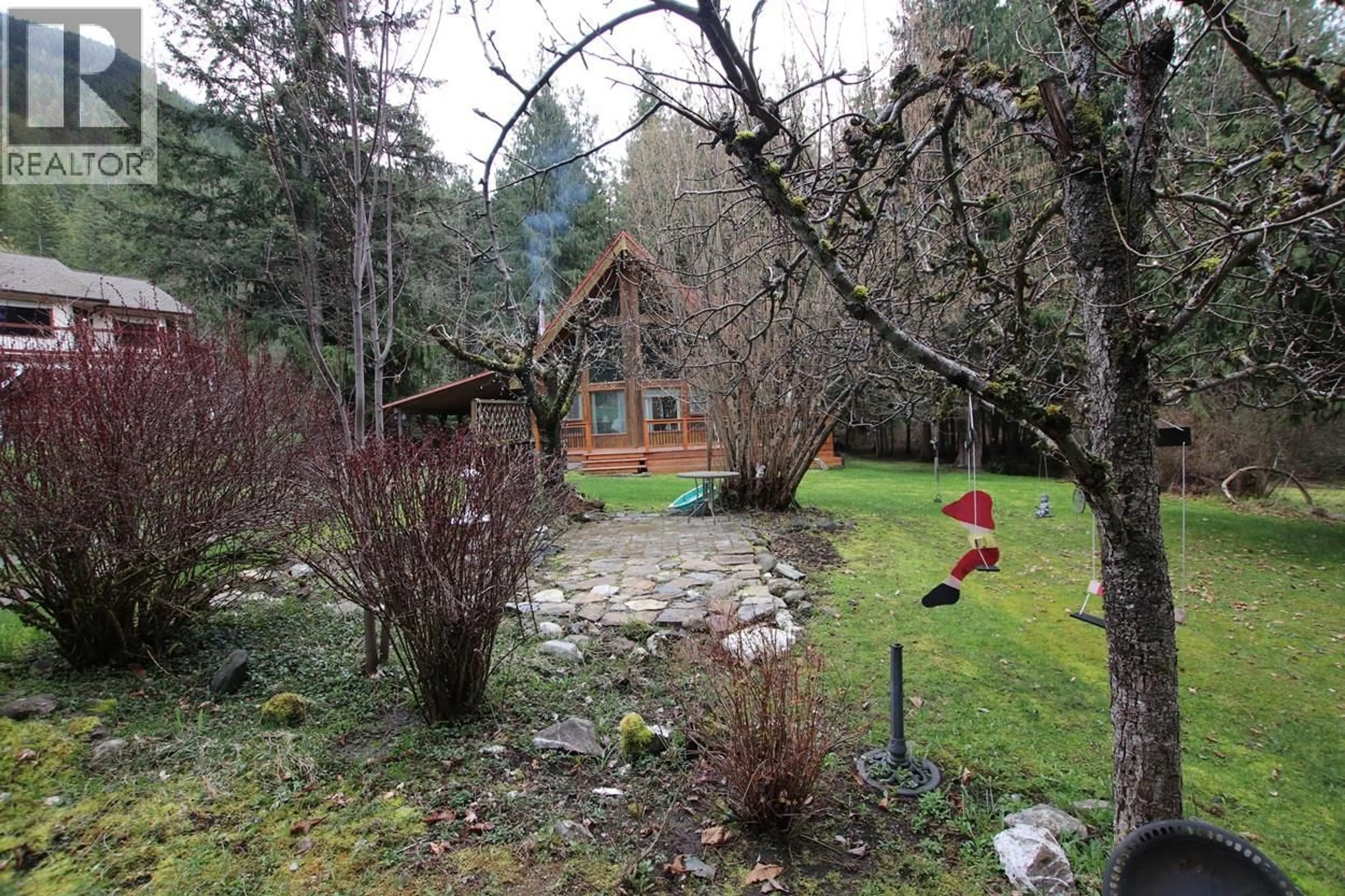 A pic from outside/outdoor area/front of a property/back of a property/a pic from drone, forest/trees view for 432 BAYLES ROAD, Nakusp British Columbia V0G1R1