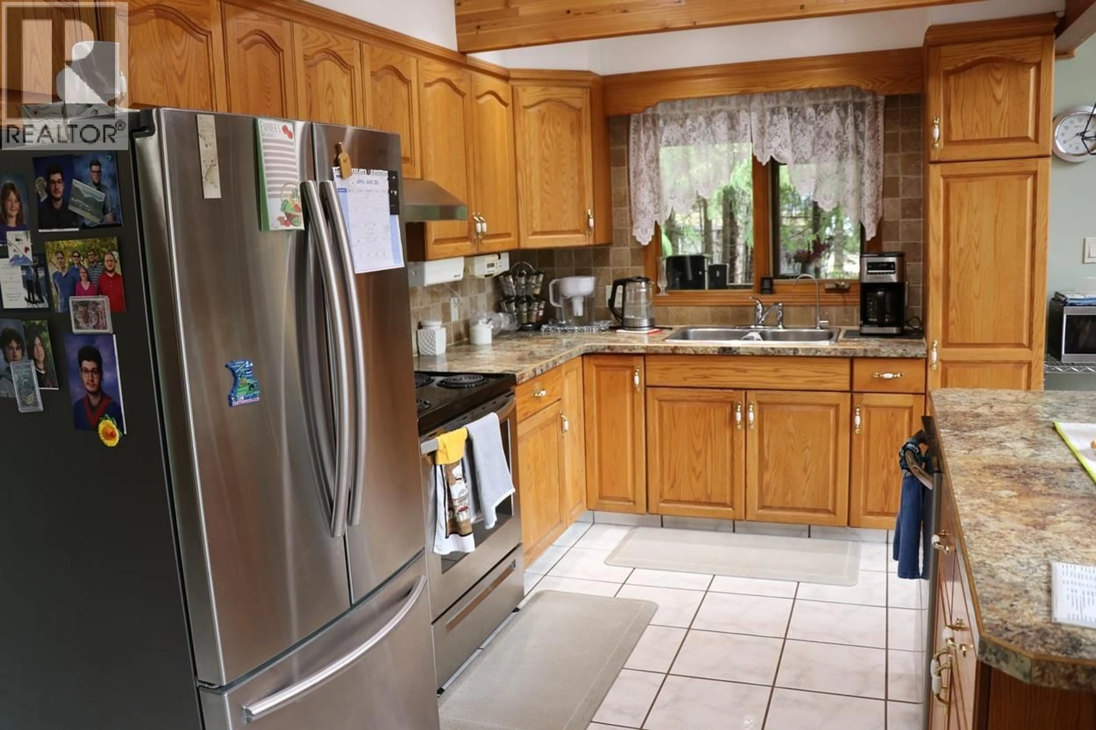 Standard kitchen, ceramic/tile floor for 432 BAYLES ROAD, Nakusp British Columbia V0G1R1
