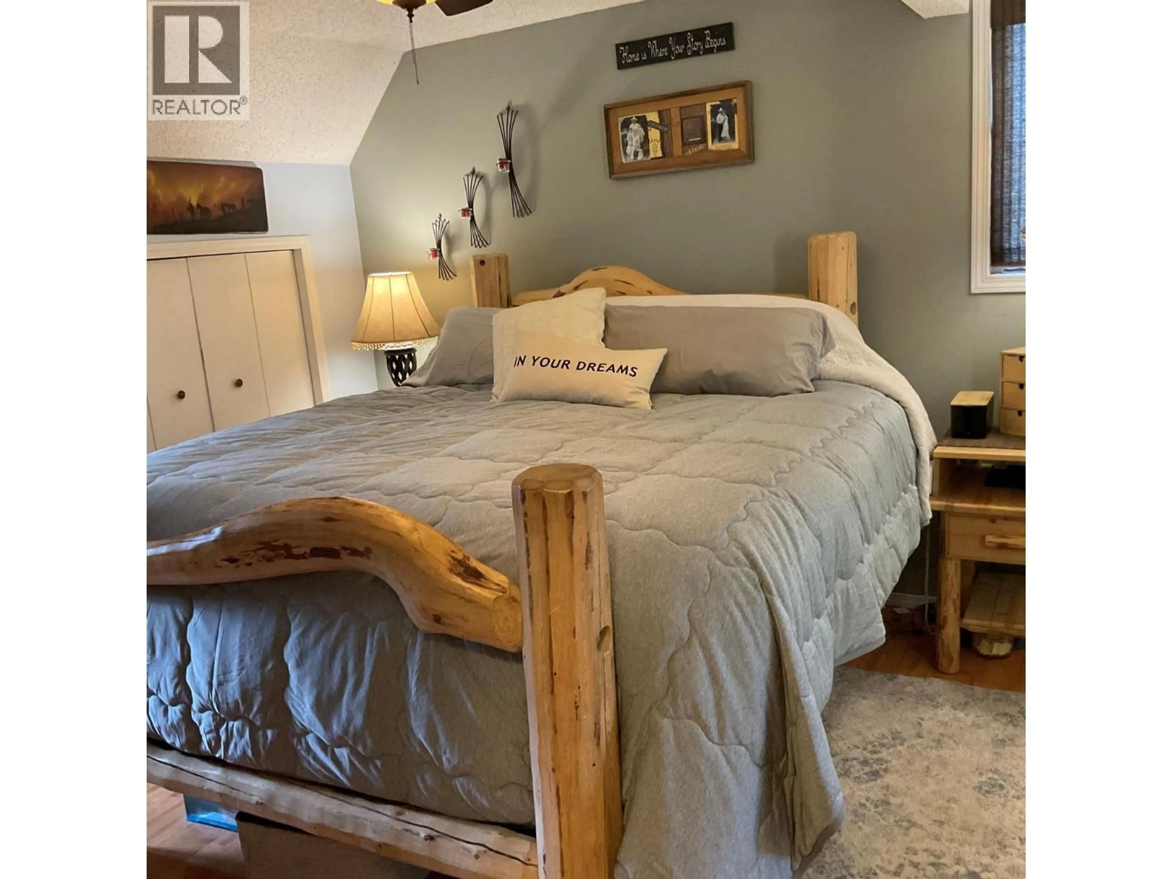 Bedroom with bed, wood/laminate floor for 1249 VALLEY VIEW DRIVE, Sparwood British Columbia V0B2G2