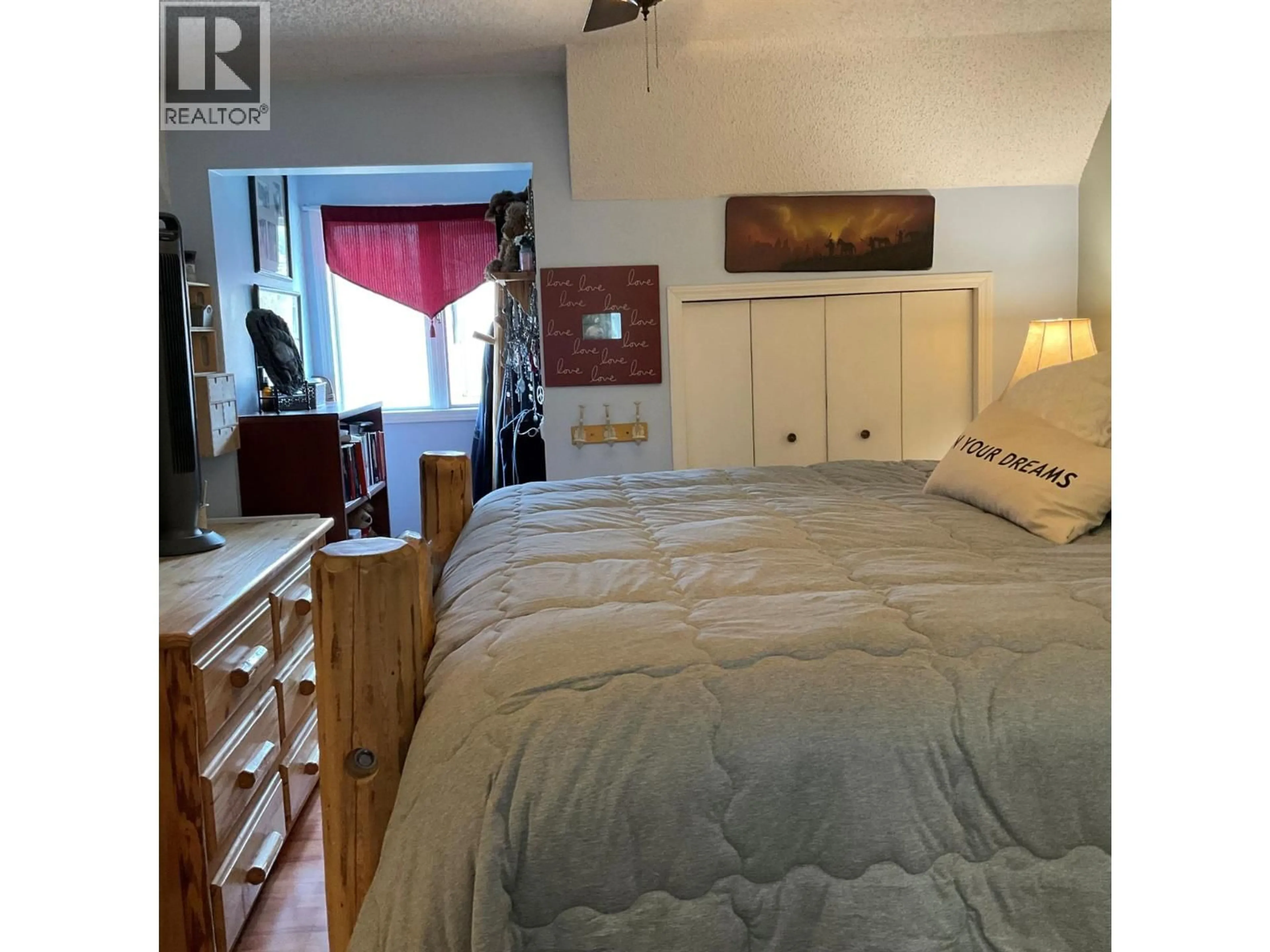 Bedroom with bed, wood/laminate floor for 1249 VALLEY VIEW DRIVE, Sparwood British Columbia V0B2G2