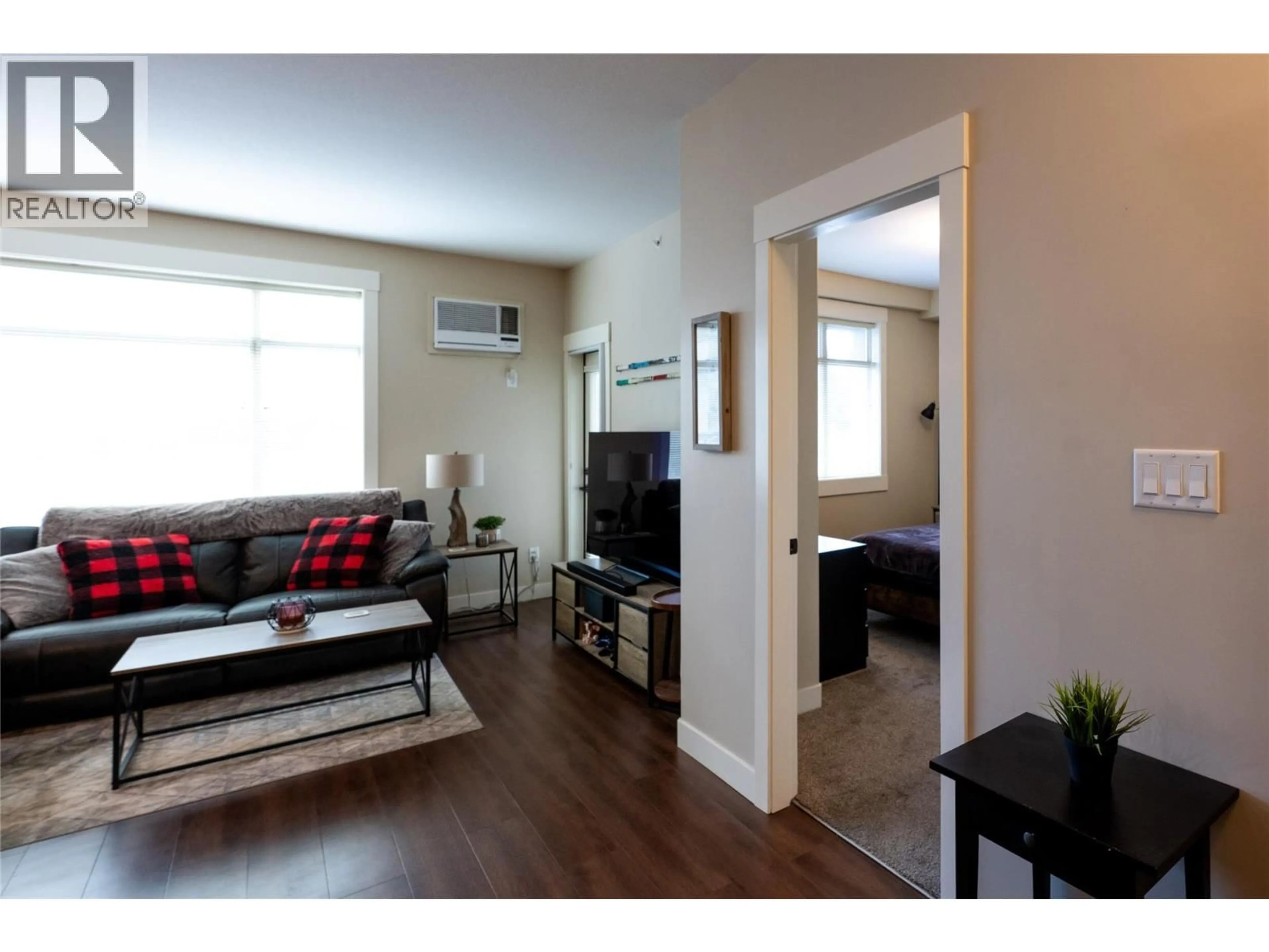 Living room with furniture, wood/laminate floor for 403 - 755 MCGILL ROAD, Kamloops British Columbia V2C0B6