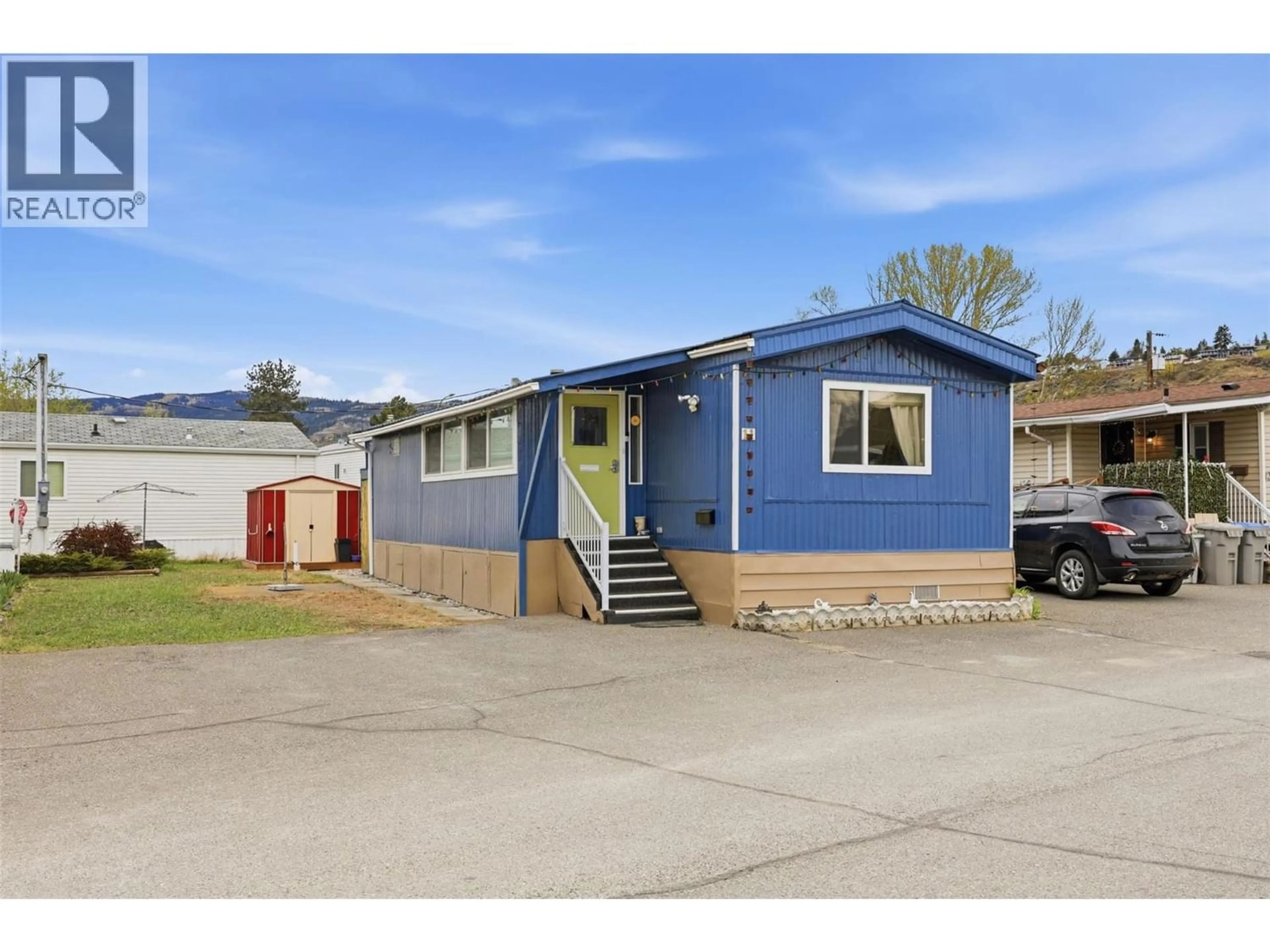 Home with vinyl exterior material, street for 11 MARS DRIVE, Kamloops British Columbia V2B1B3