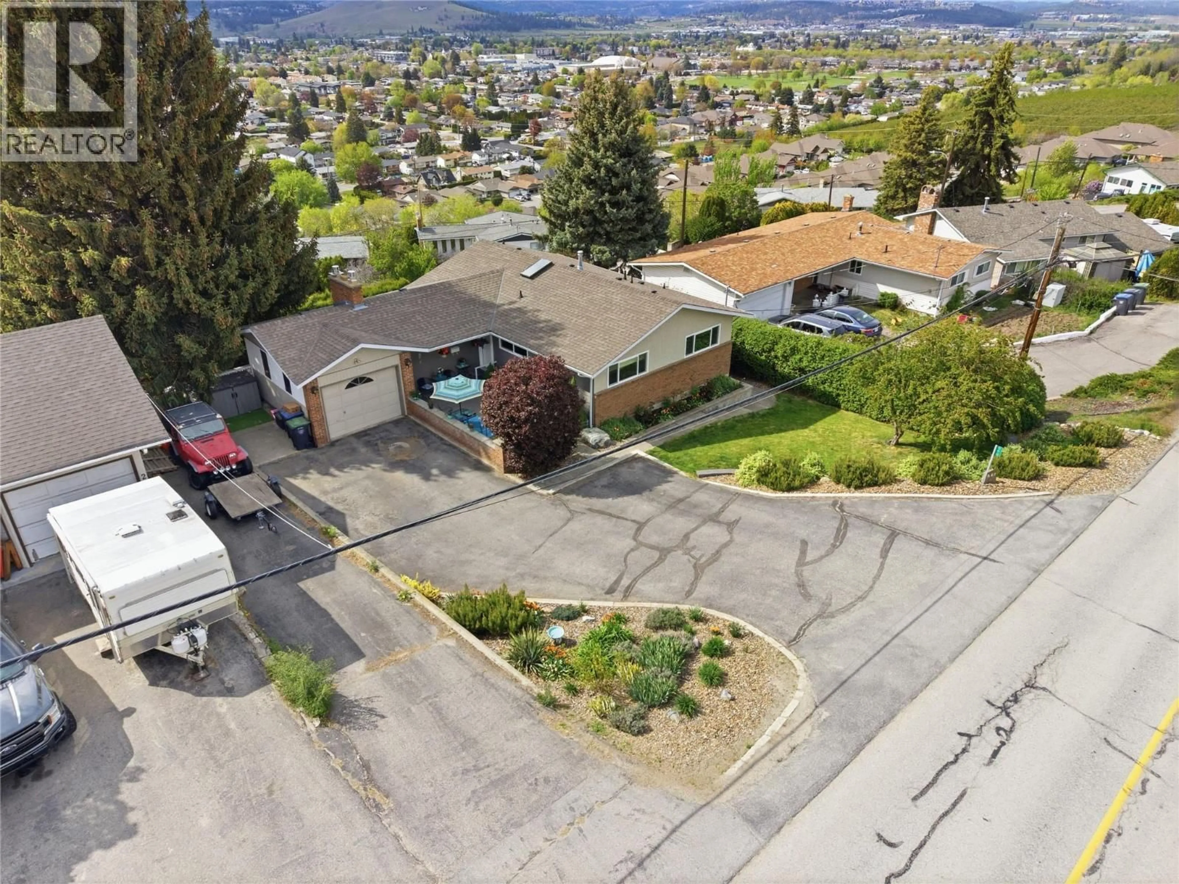 A pic from outside/outdoor area/front of a property/back of a property/a pic from drone, mountain view for 869 MCKENZIE ROAD, Kelowna British Columbia V1X2B4