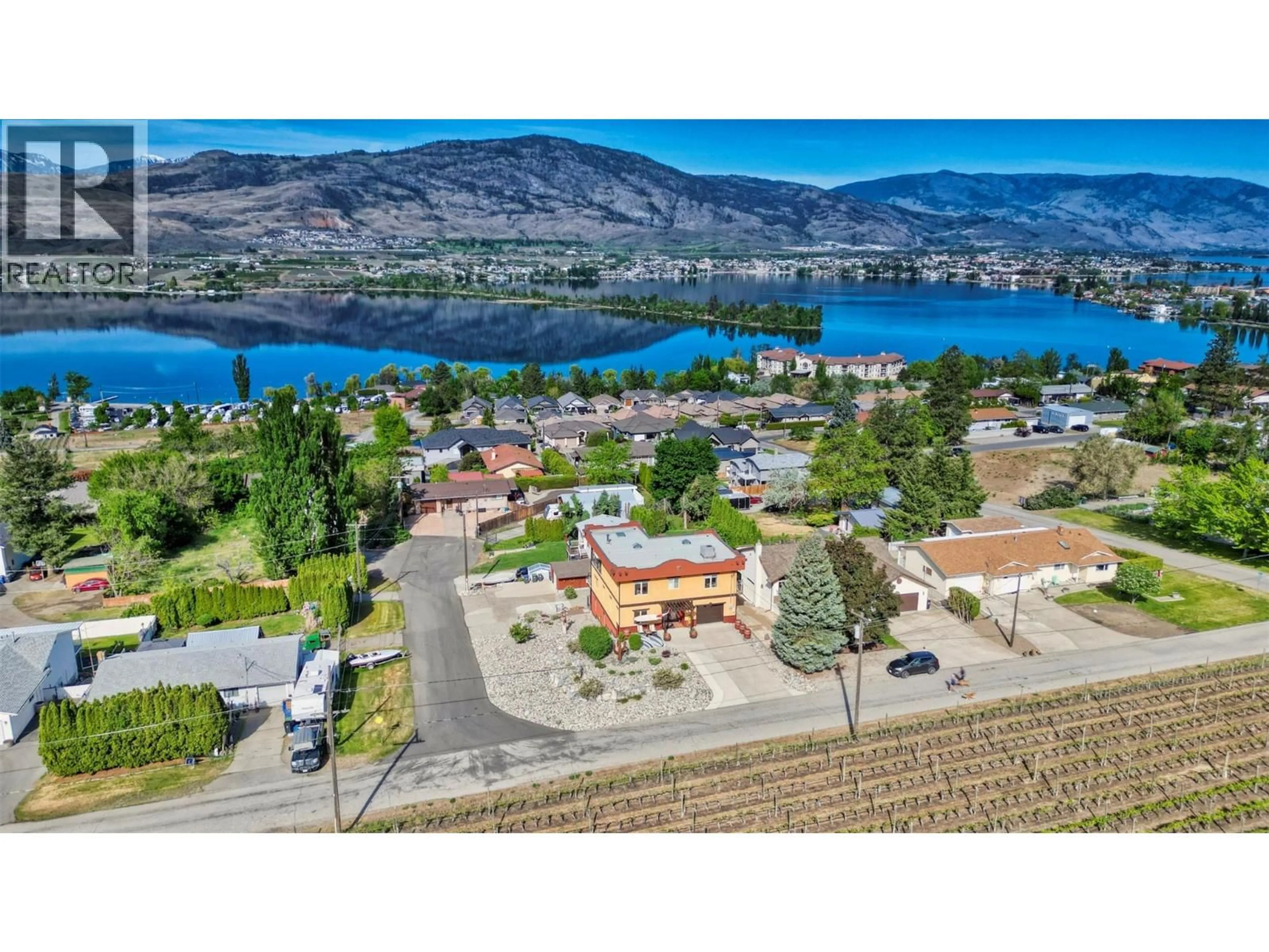 A pic from outside/outdoor area/front of a property/back of a property/a pic from drone, water/lake/river/ocean view for 3602 33RD STREET, Osoyoos British Columbia V0H1V6