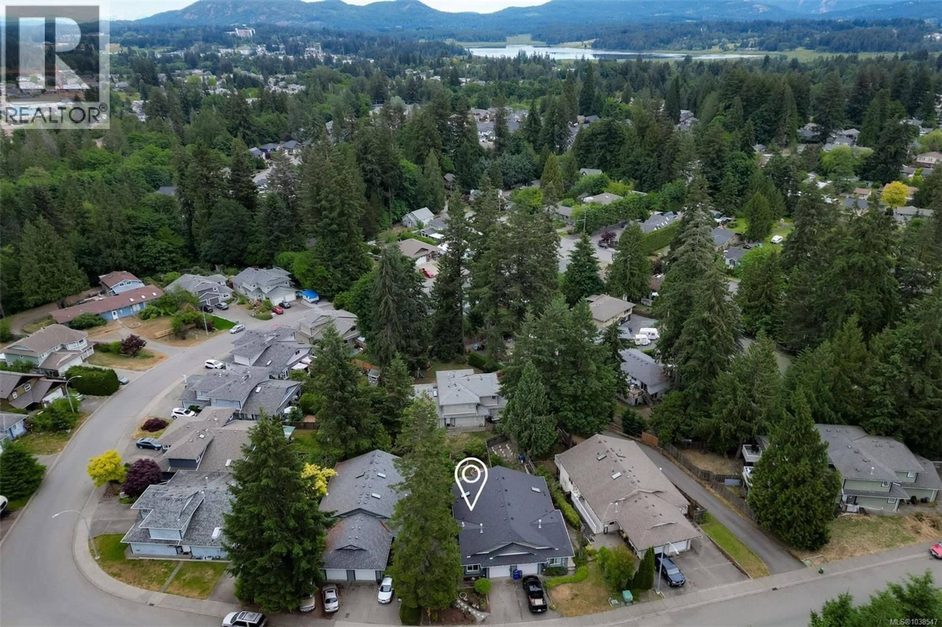A pic from outside/outdoor area/front of a property/back of a property/a pic from drone, mountain view for 5909 UPLAND AVENUE, Duncan British Columbia V9L6P7