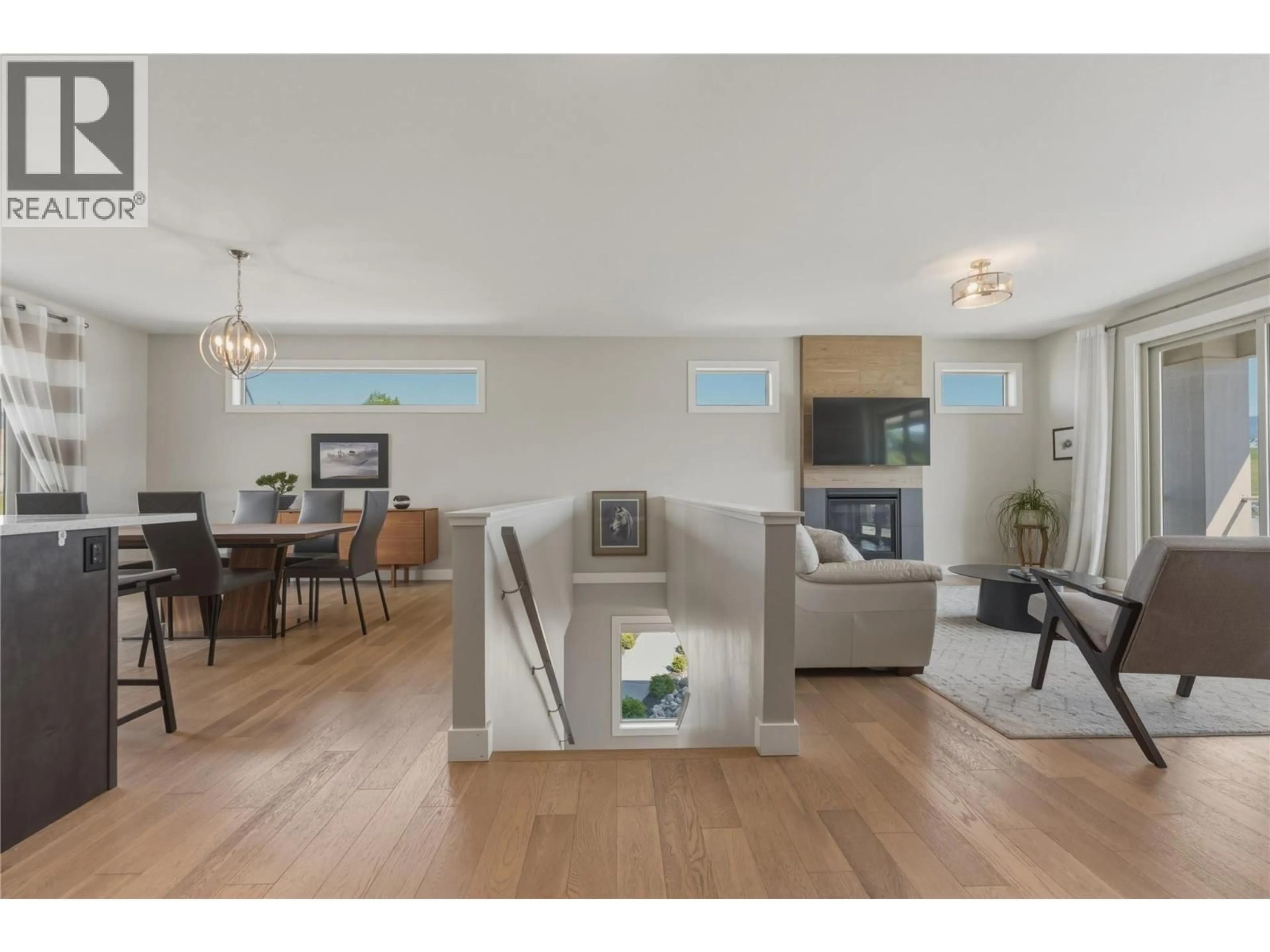 Open concept kitchen, wood/laminate floor for 5709 RICHFIELD PLACE, Vernon British Columbia V1H1A6